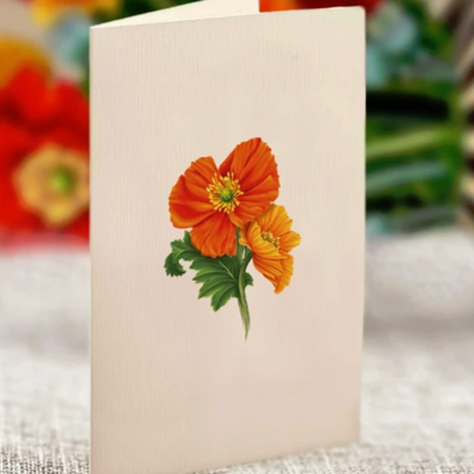 Folded card with orange flower illustration