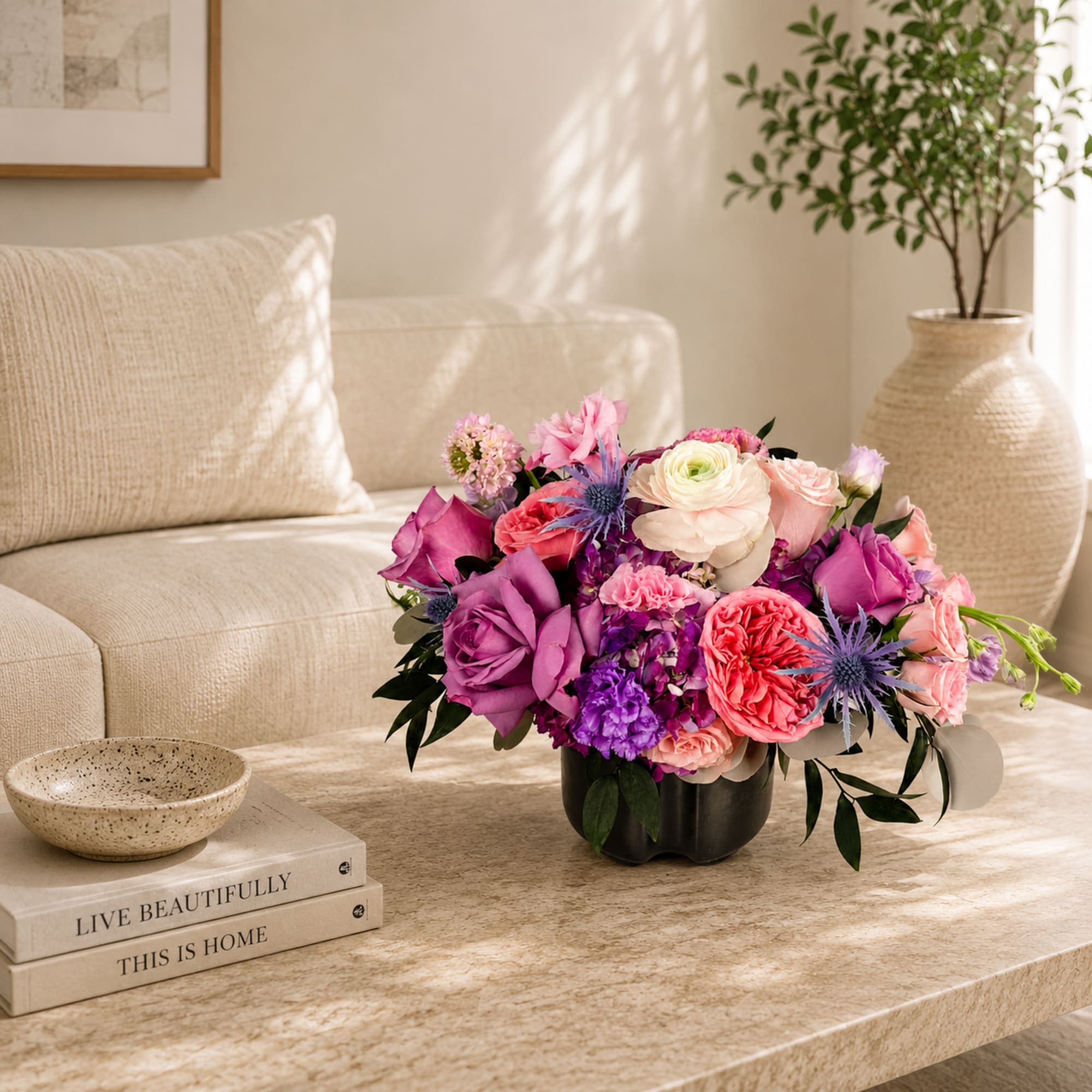 A lavish cluster of pink, lavender, coral and white blooms packed into, photo 2 of 2