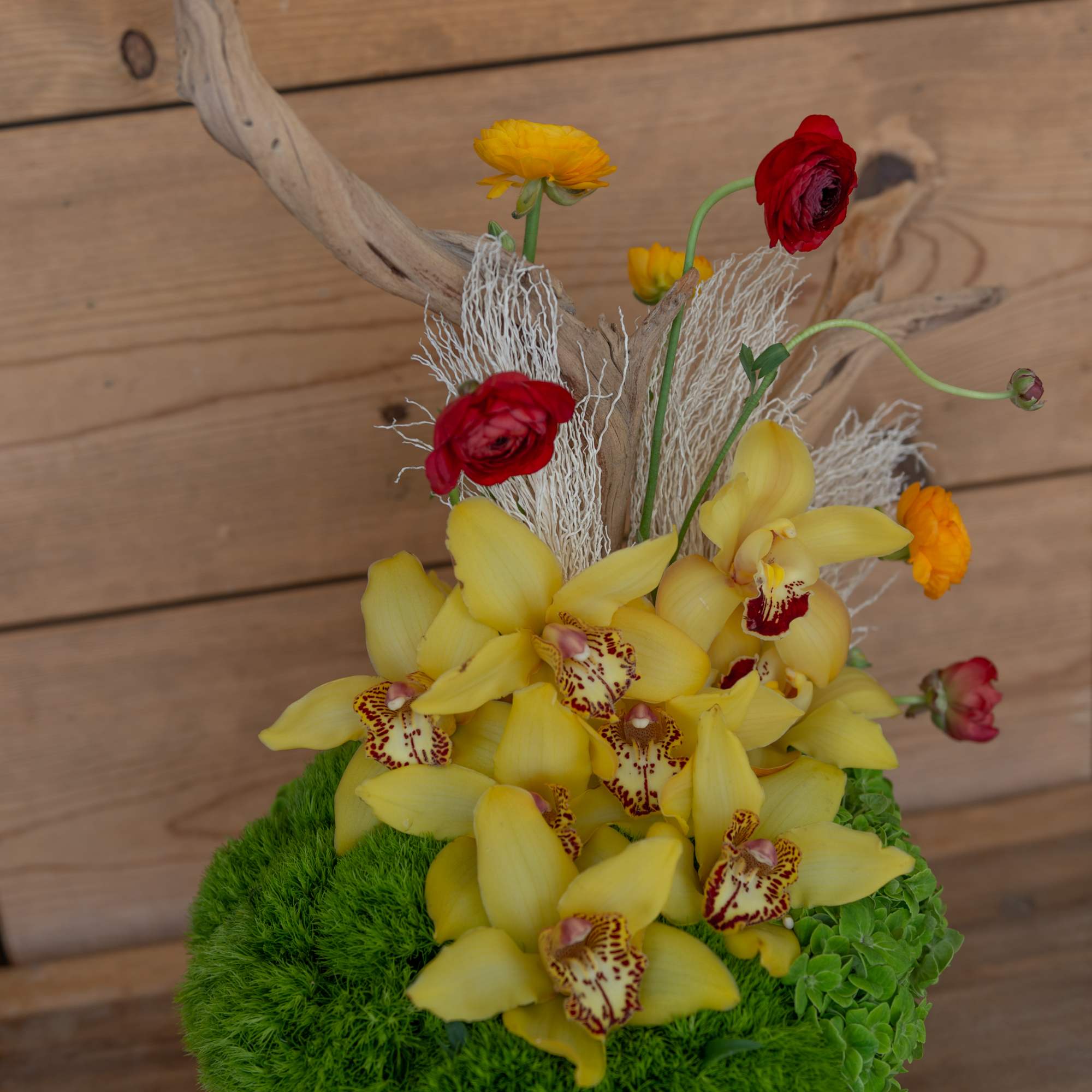 California is a modern arrangement delicately arranged with yellow, orange and red