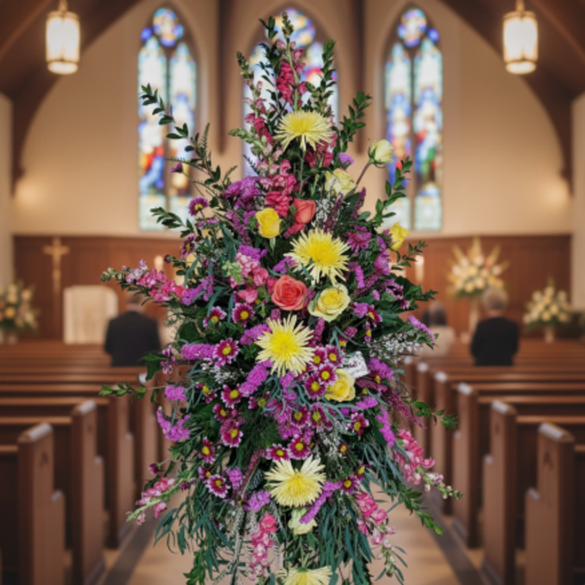 Honor a beautiful life with our Celebration of Life Standing Spray, a