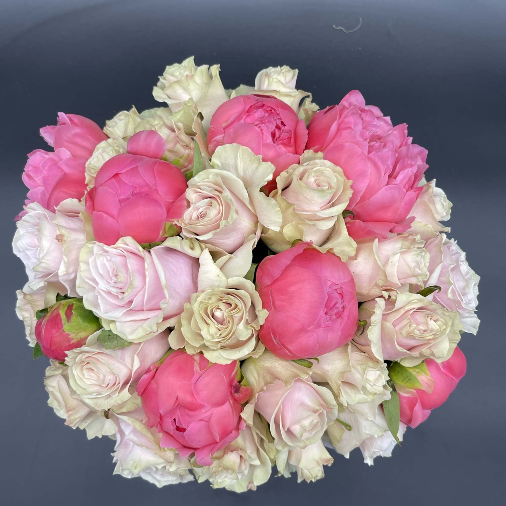 
10 peonies TWO dozen pink roses.
Color of peonies may vary!
*****This design will