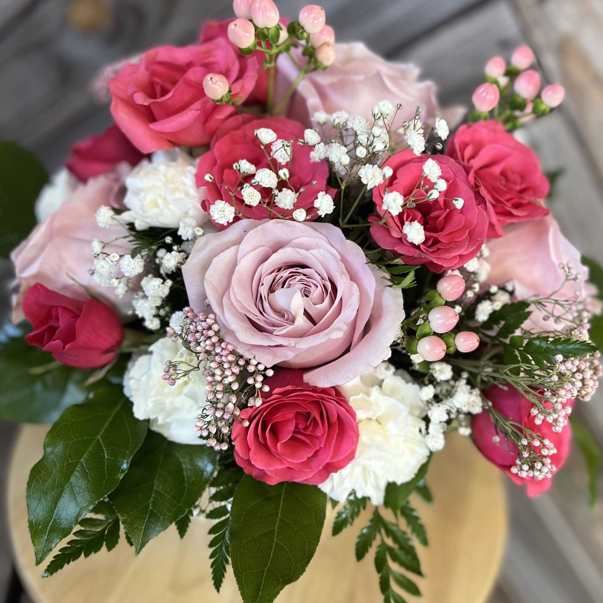Pink and white rose bouquet with baby's breath