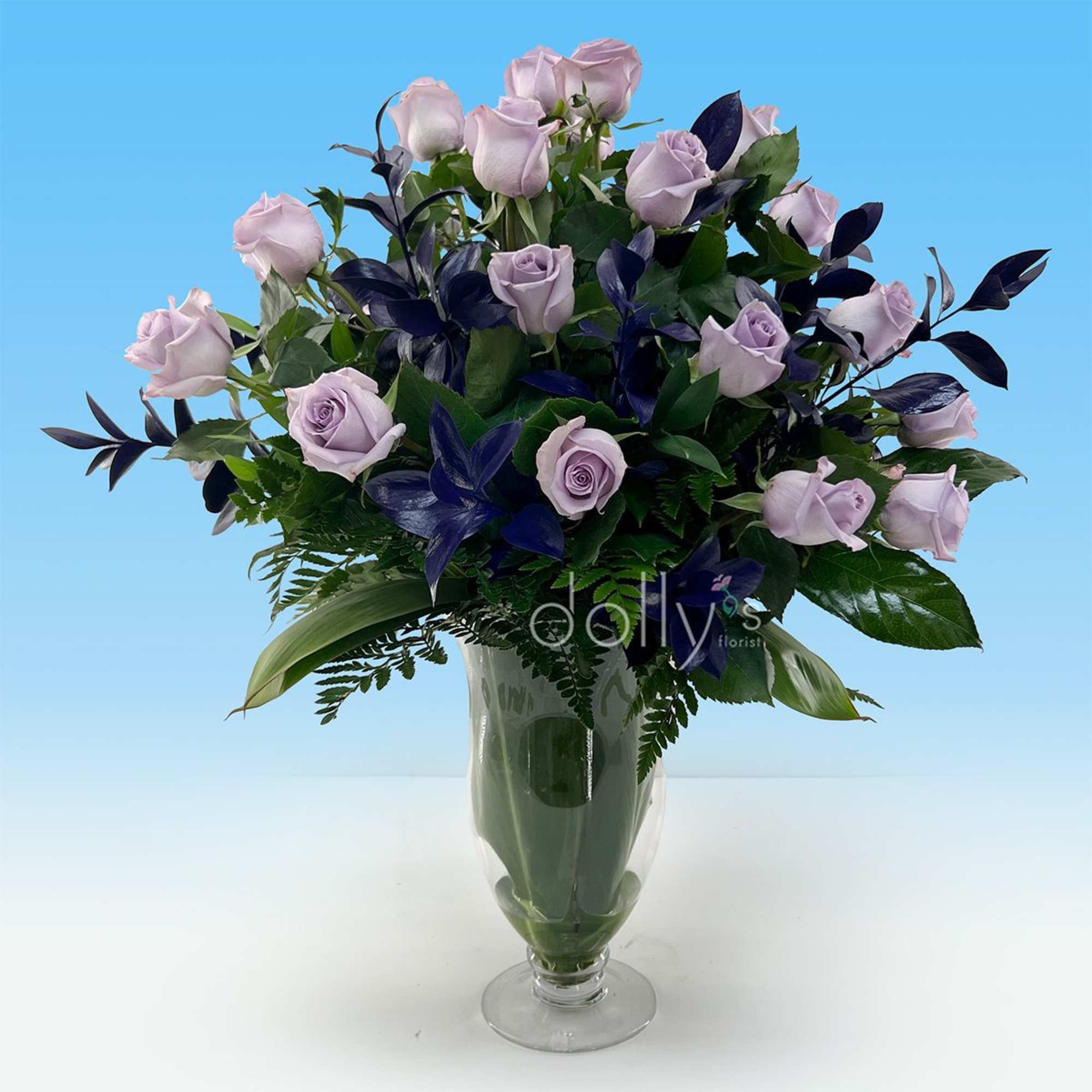 Pale lavender long-stem roses take center stage in this classic 36-stem arrangement