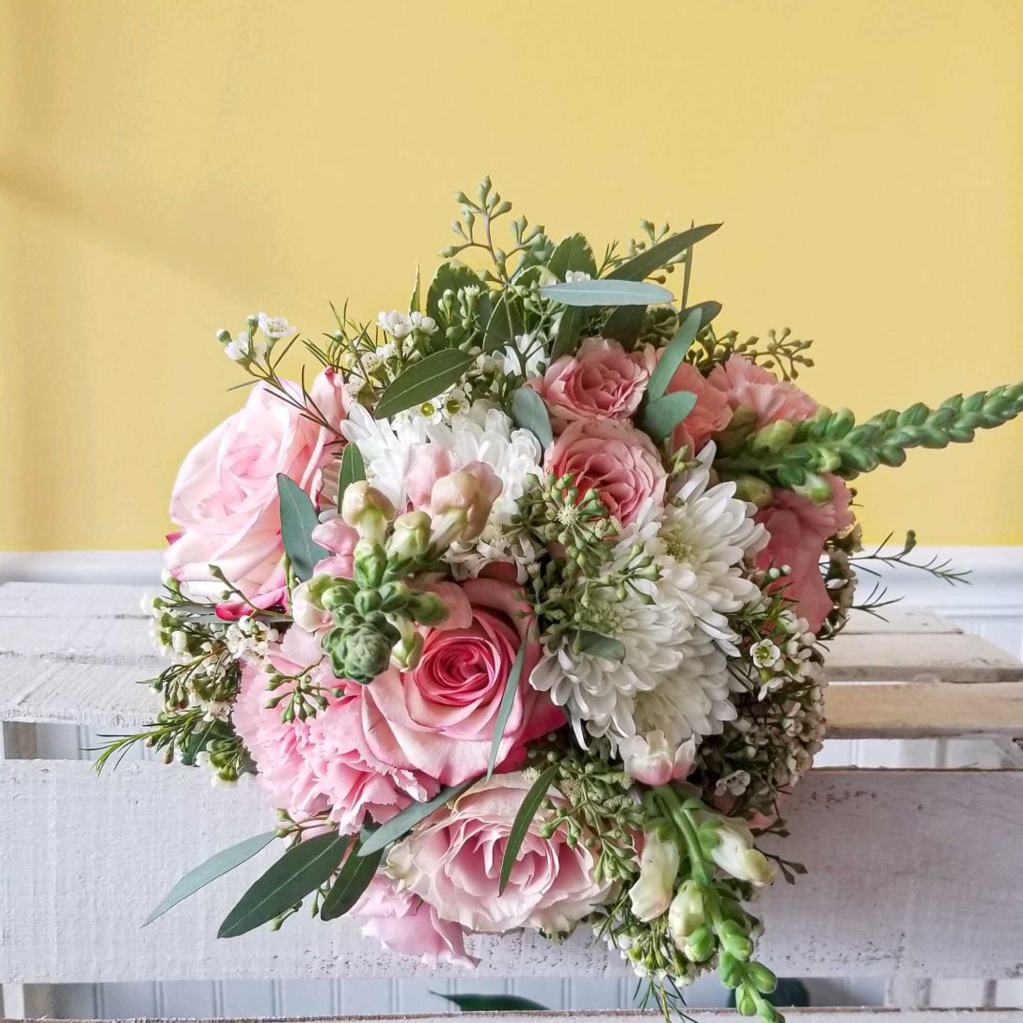 Pink and white bouquet with roses and daisies