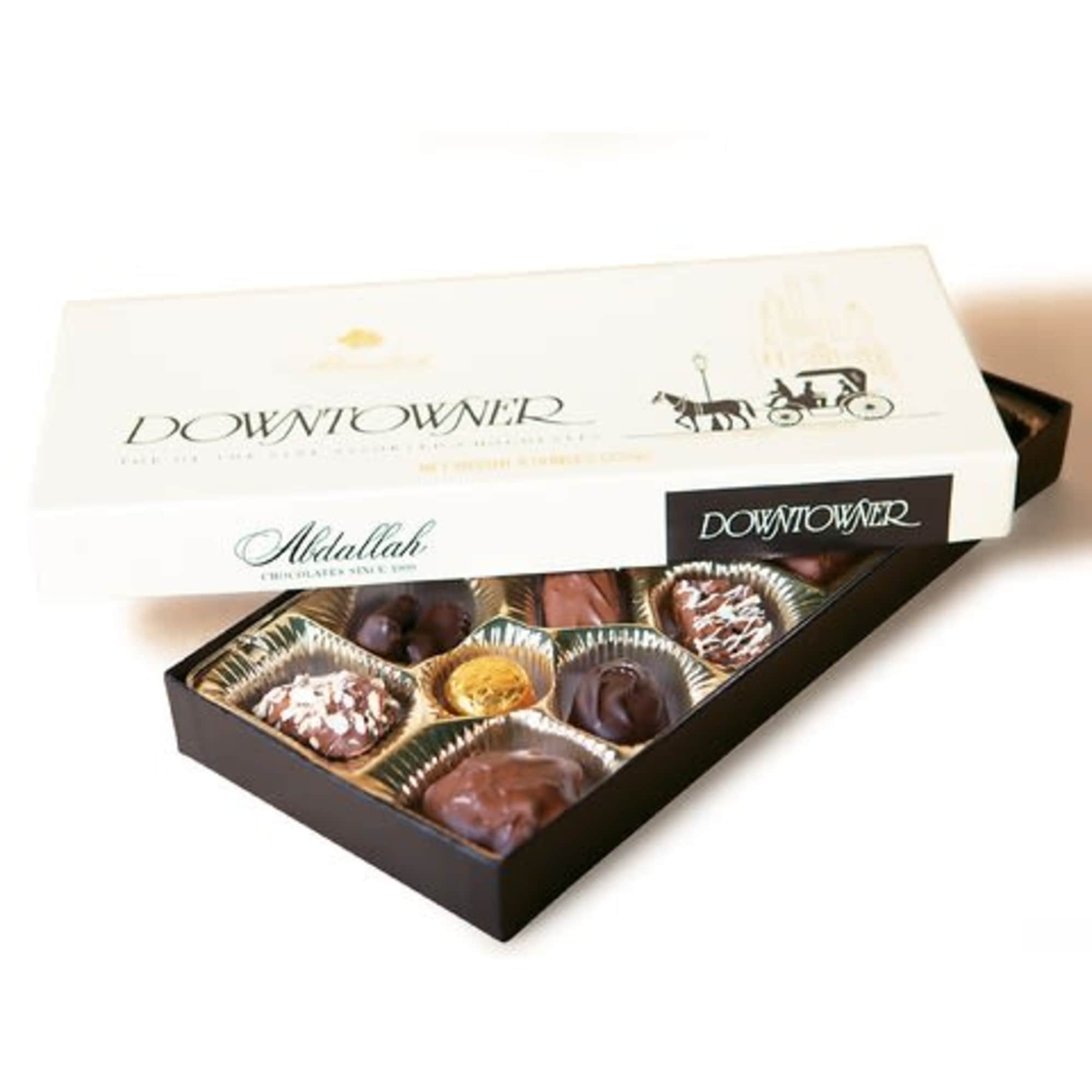 Box of assorted chocolates with the lid partly open
