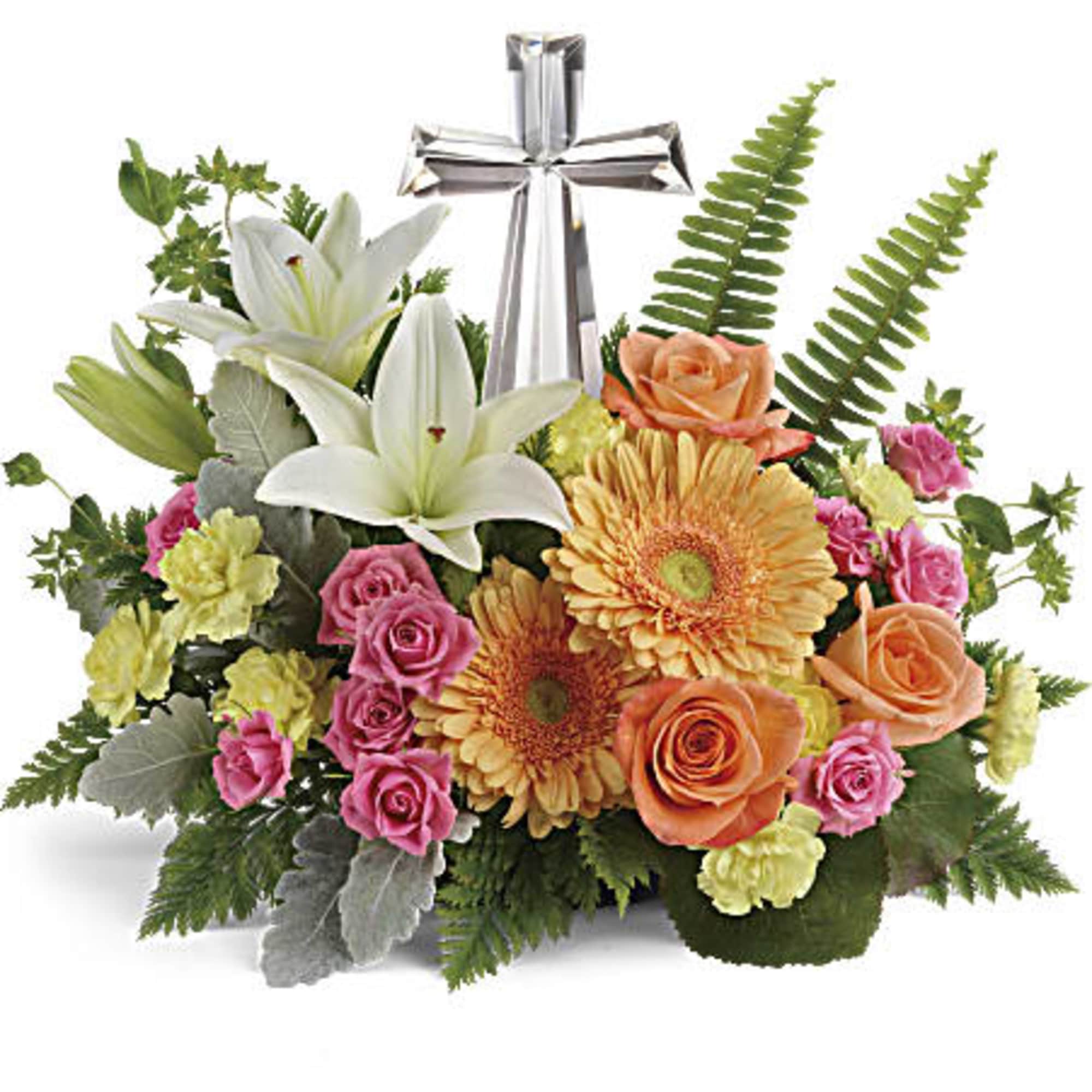 Mixed bouquet with white lilies, roses, gerbera daisies, and a silver cross