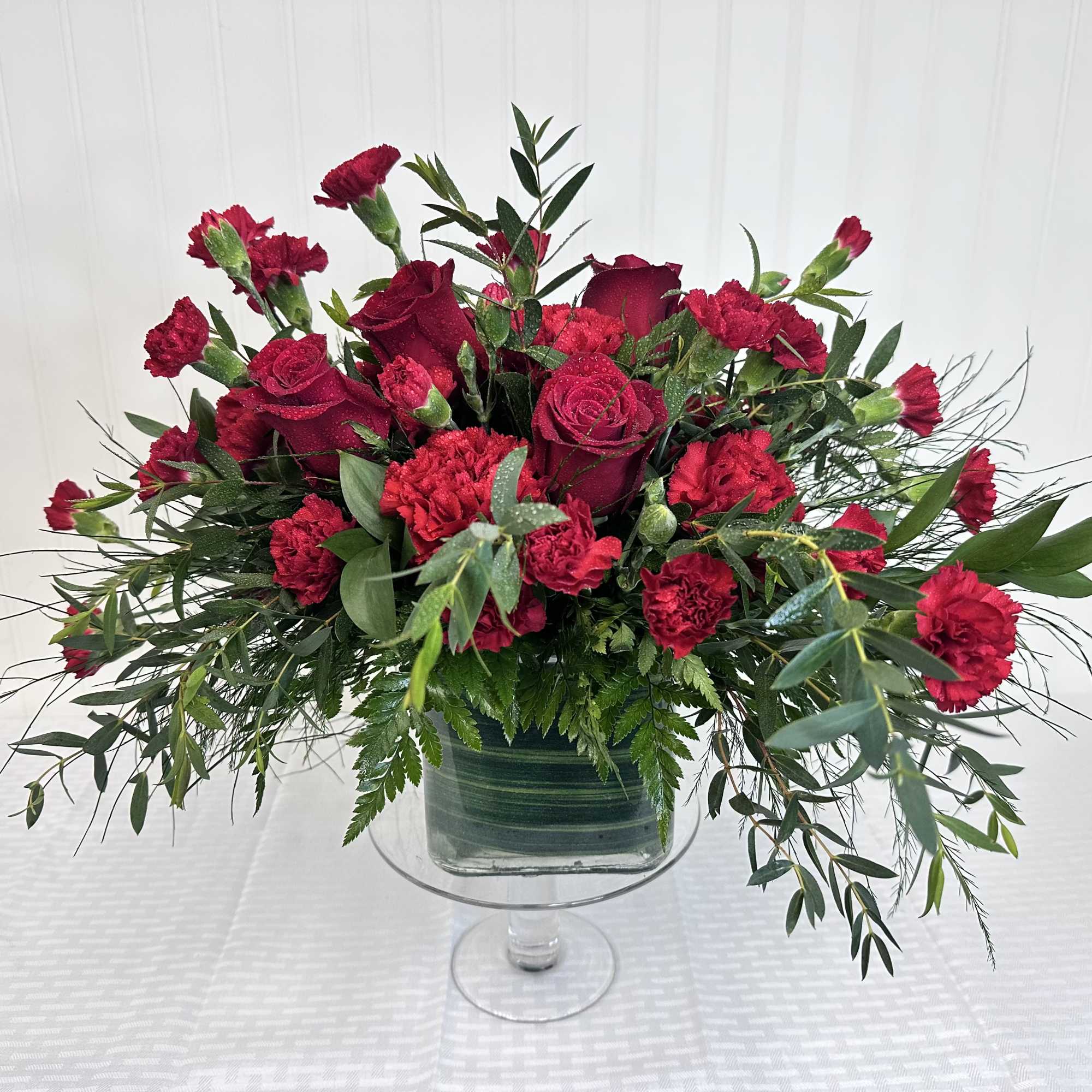 Flowers and containers are subject to substitution and availability.