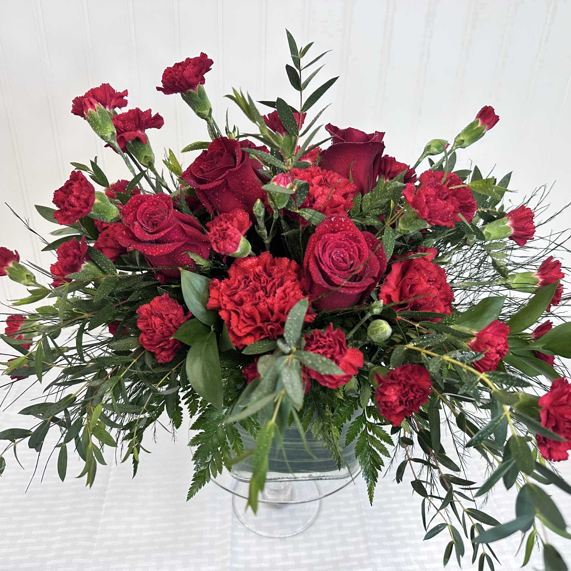 Flowers and containers are subject to substitution and availability.