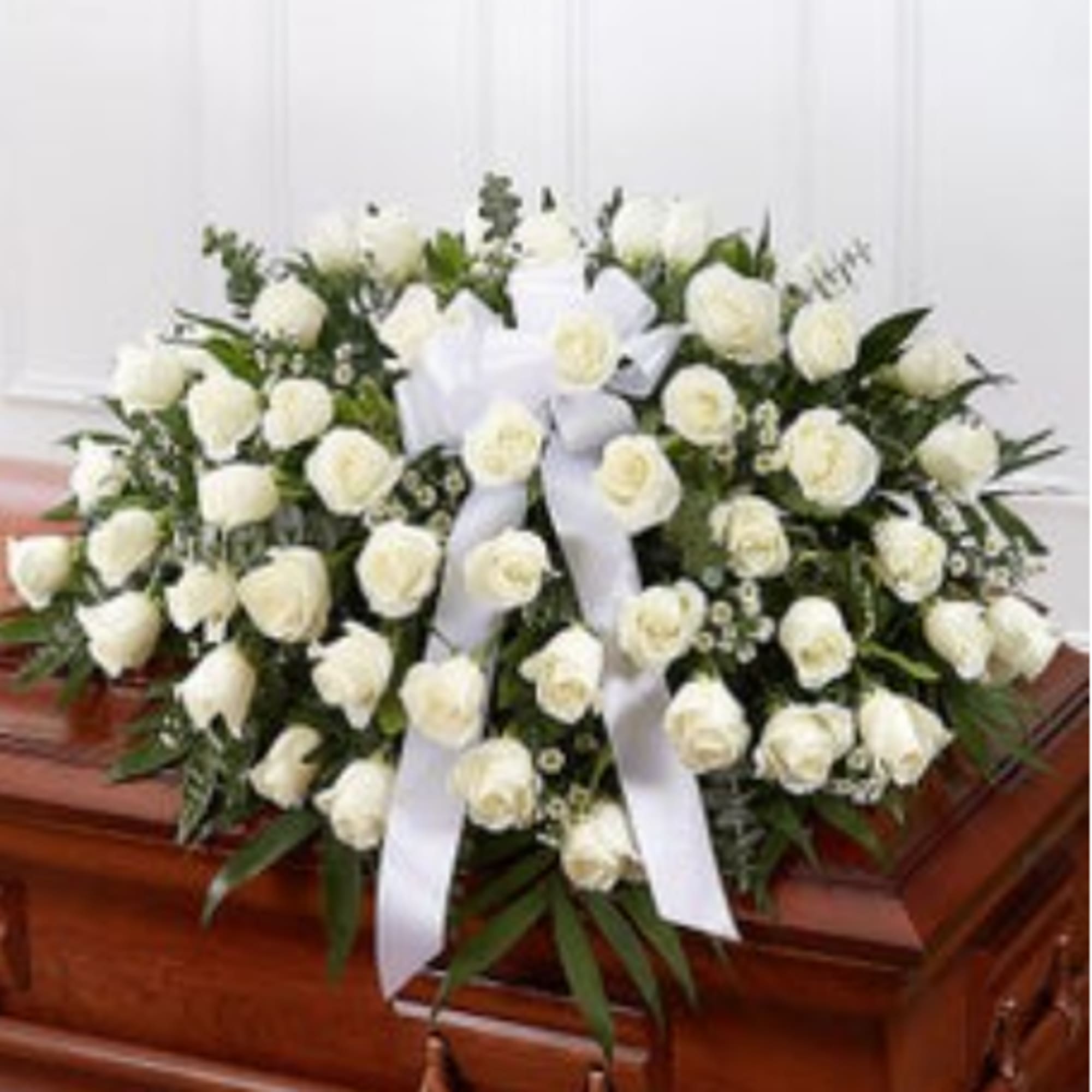 Our half casket cover, crafted with care and artistry by our expert