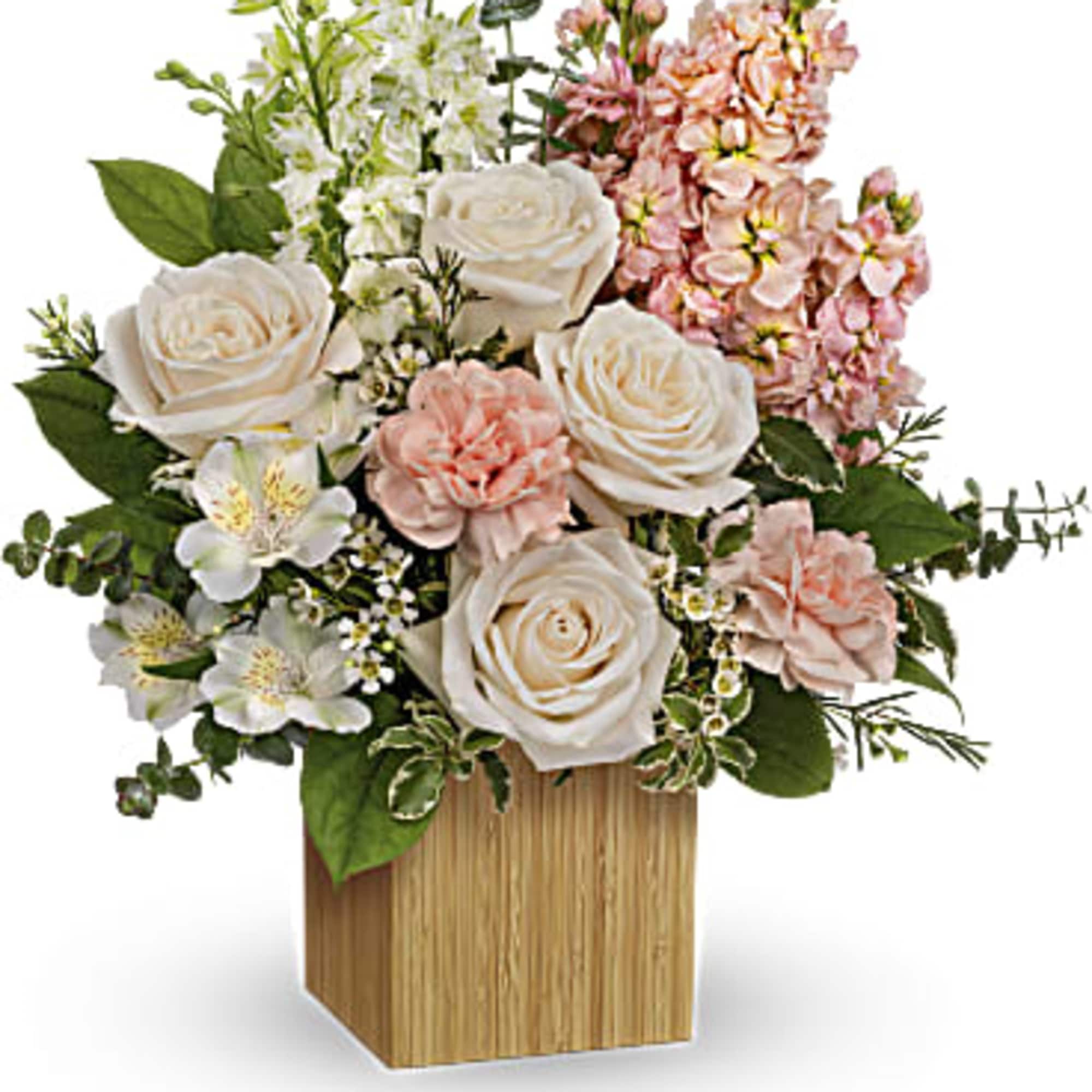 Celebrate your adoration with this artistic bouquet of creamy blooms and lush
