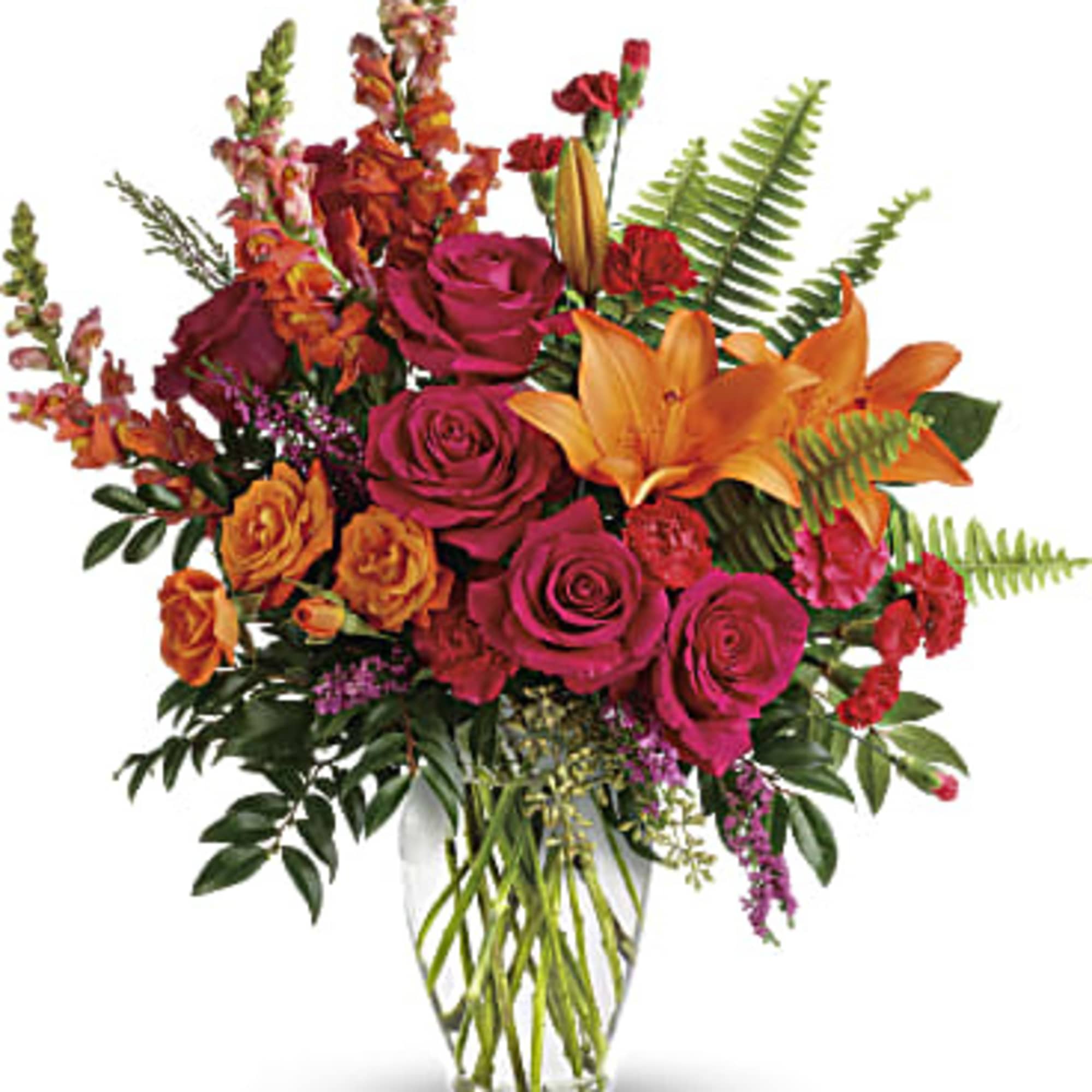 Bouquet of pink roses and orange lilies in a clear glass vase
