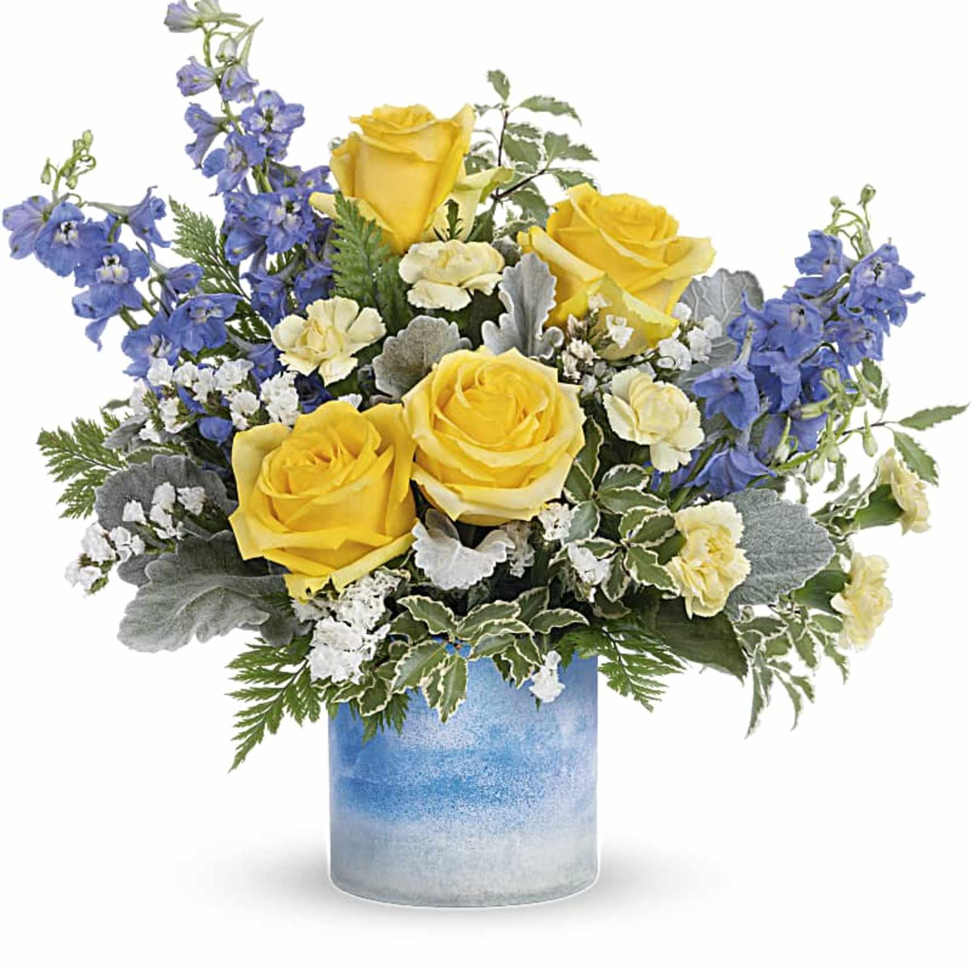 Yellow roses and blue delphinium in a blue glass vase