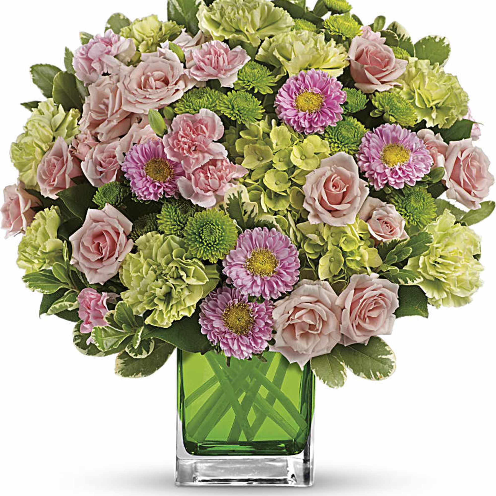 Pink roses and green carnations in a square glass vase