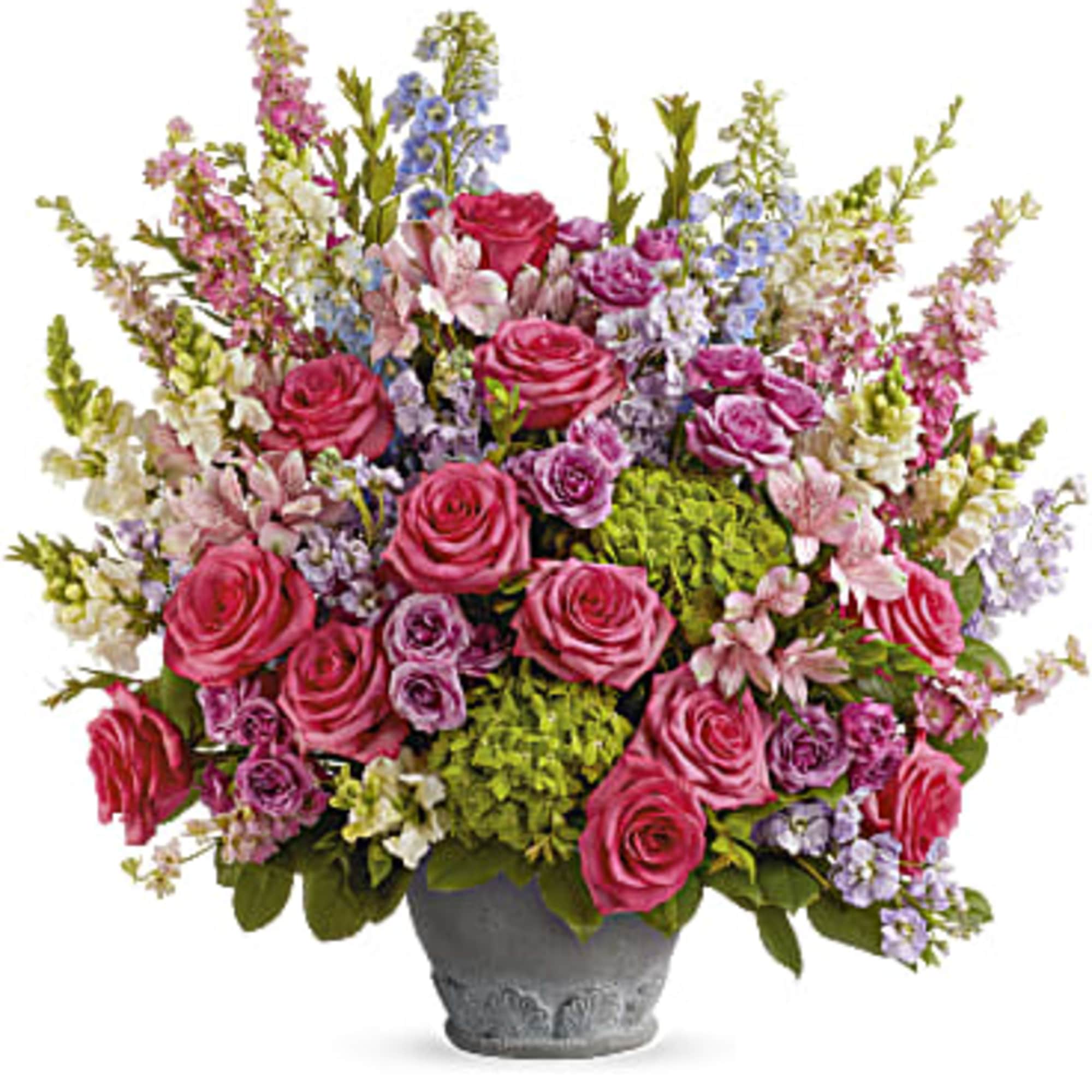 Pink roses and pastel flowers arranged in a gray pot