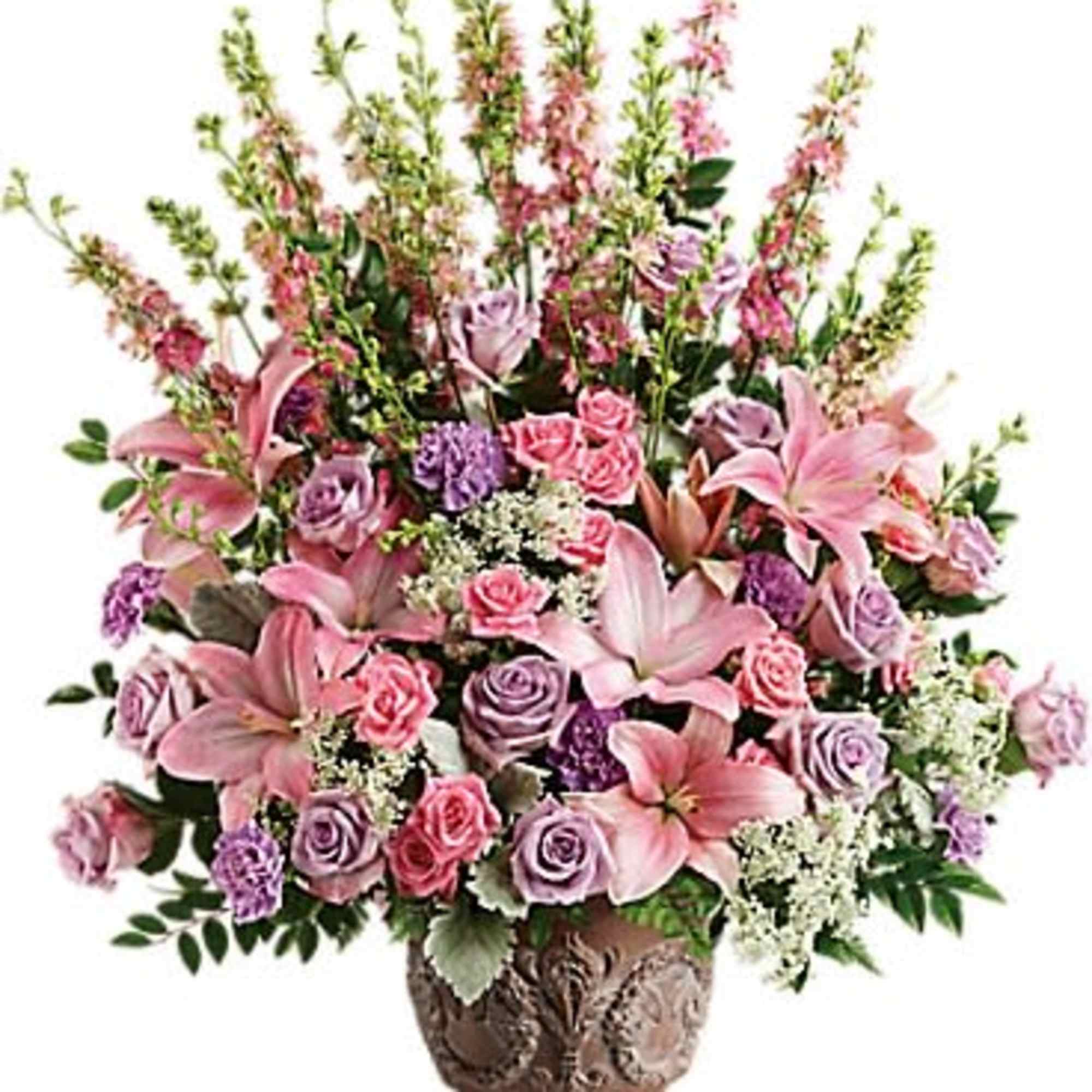 Pink and lavender floral arrangement in a decorative vase