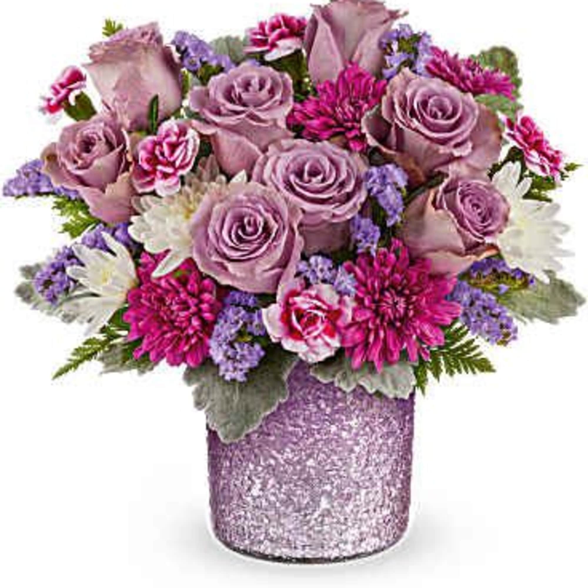 Lavender roses and pink flowers in a glittery purple vase