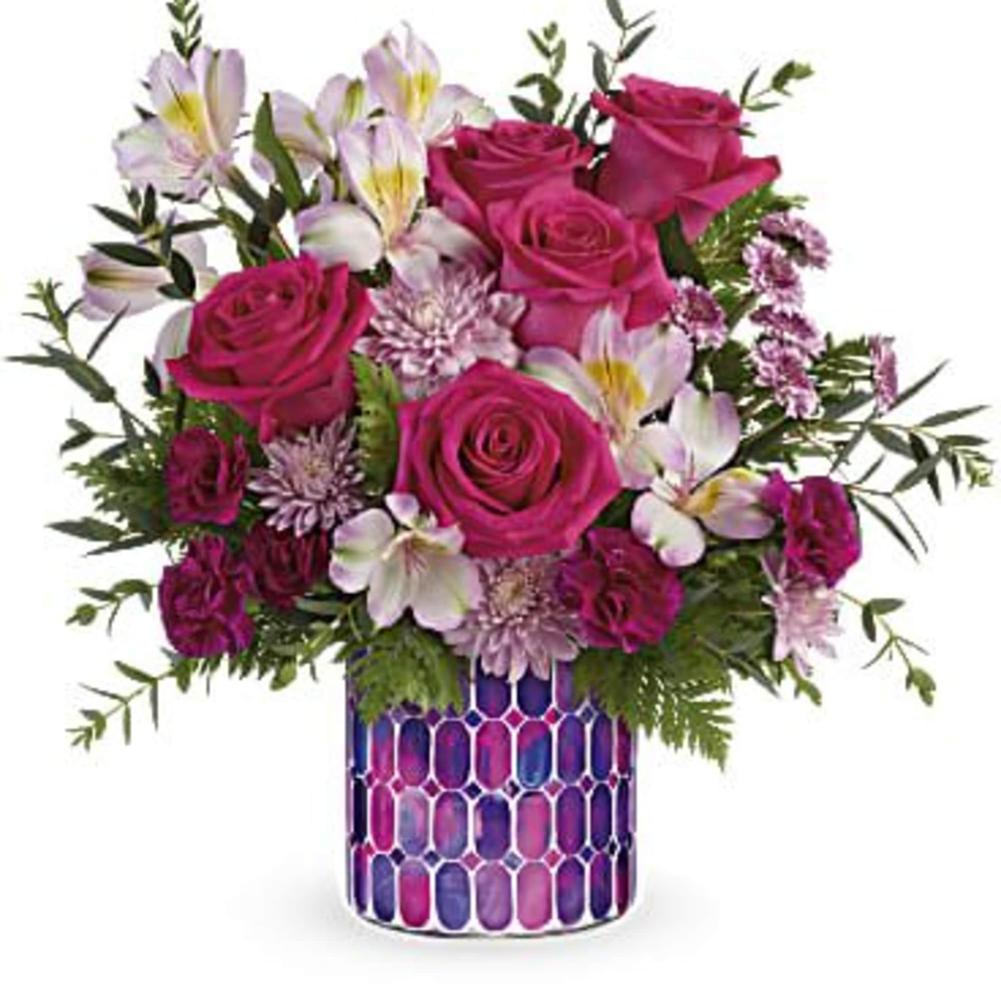 Pink roses and white alstroemeria in a patterned vase