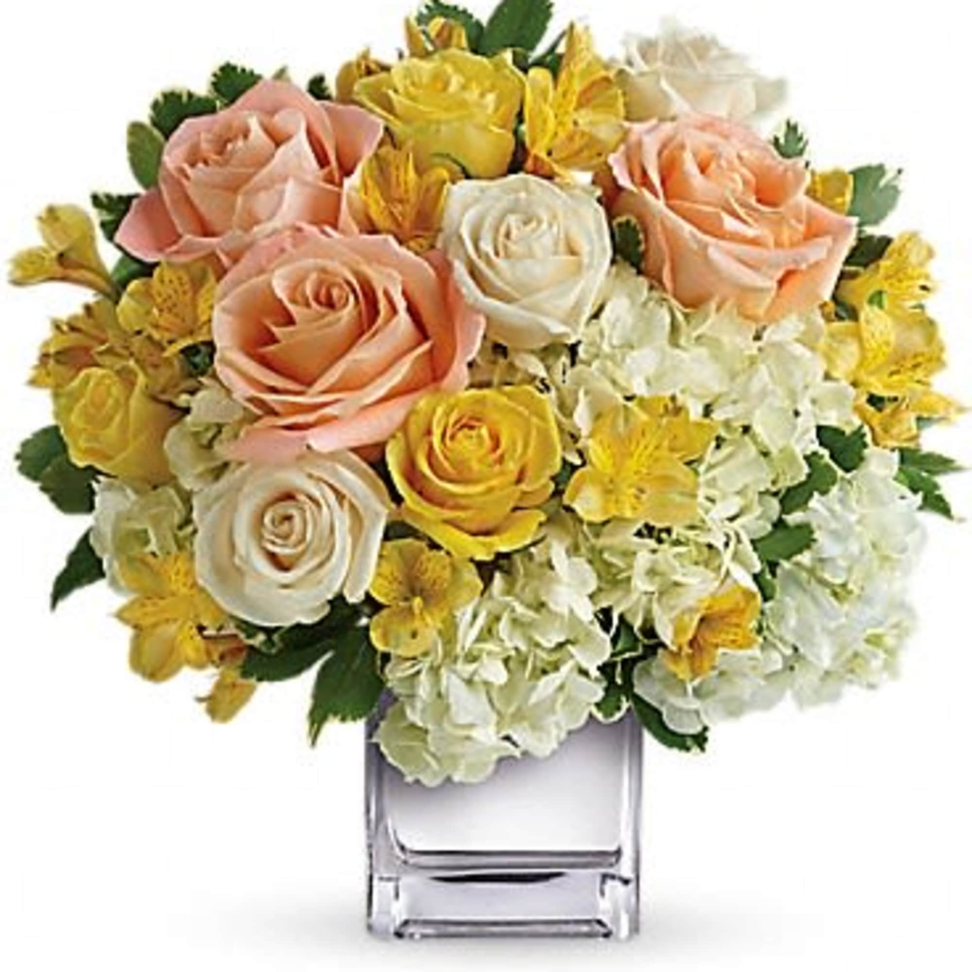This sparkling array of sunny favorites in a silver cube vase will