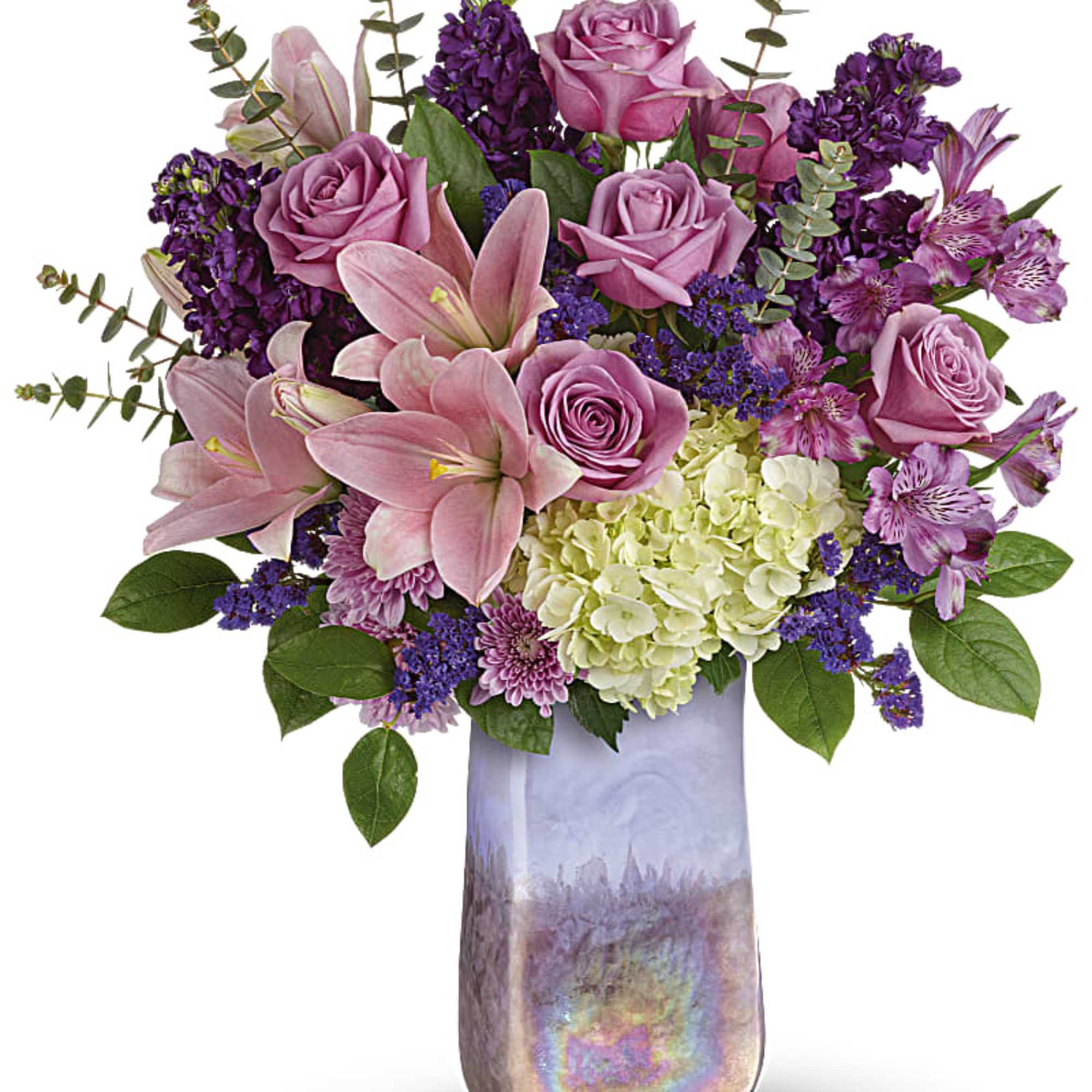 Pink roses and lilies in a tall iridescent vase