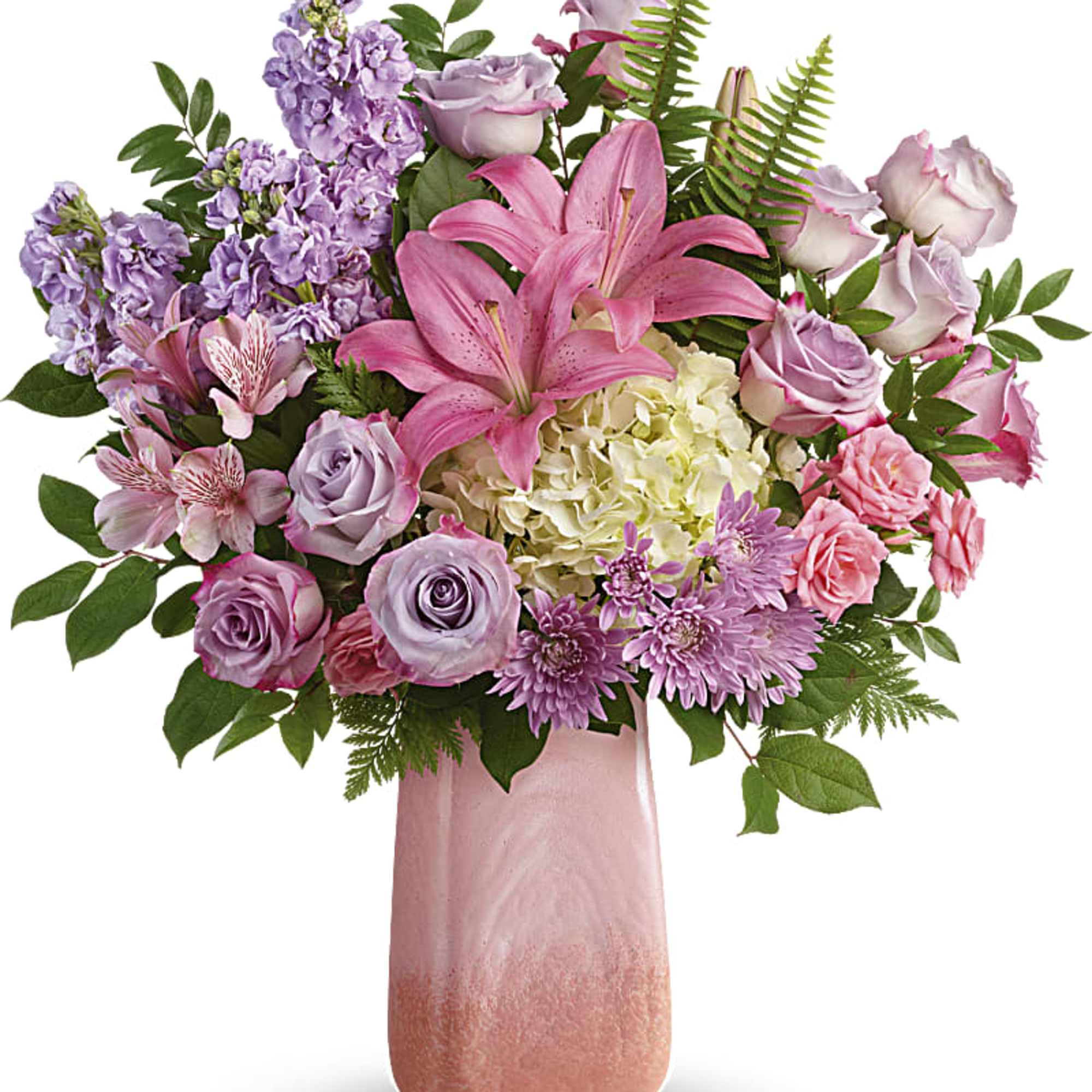 Pink and lavender bouquet with lilies, roses, and hydrangea in a pink vase