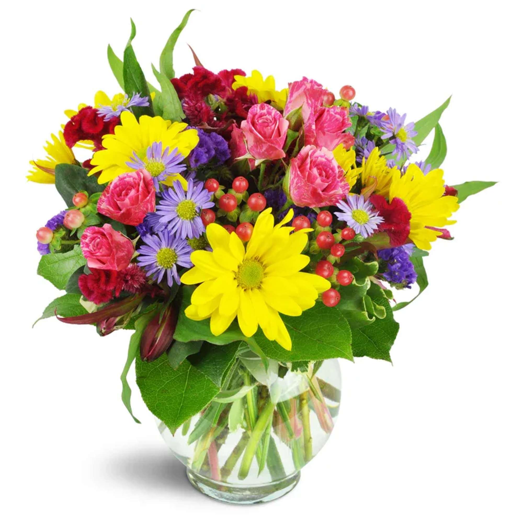 Mixed bouquet of pink roses, yellow daisies, and purple flowers in a glass vase