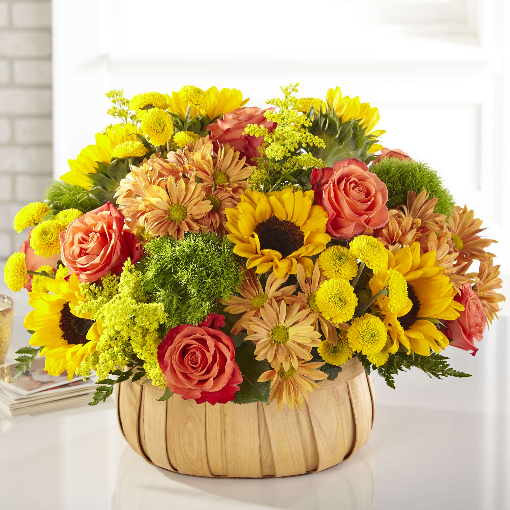 Rustic, natural beauty and vibrant shades fill this arrangement. Our Harvest Sunflower