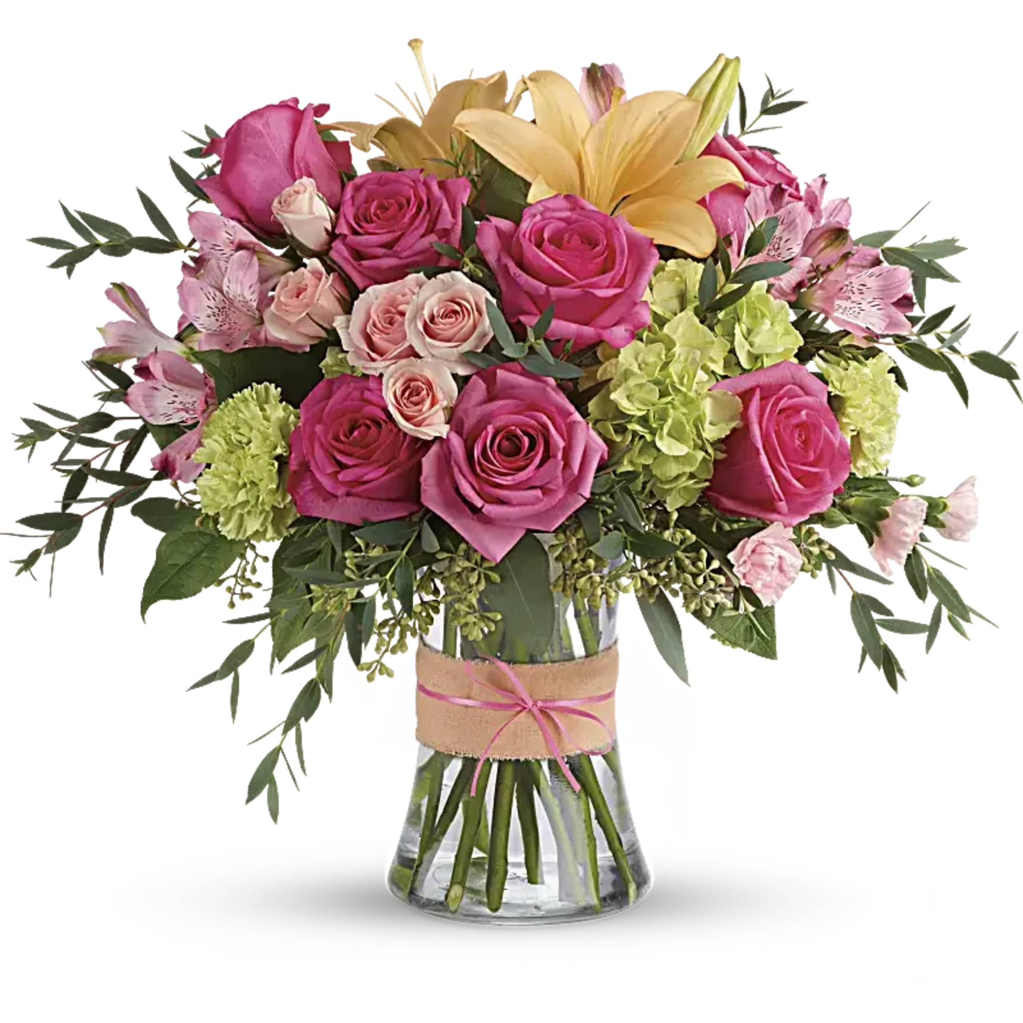 Pink and peach roses with lilies in a glass vase