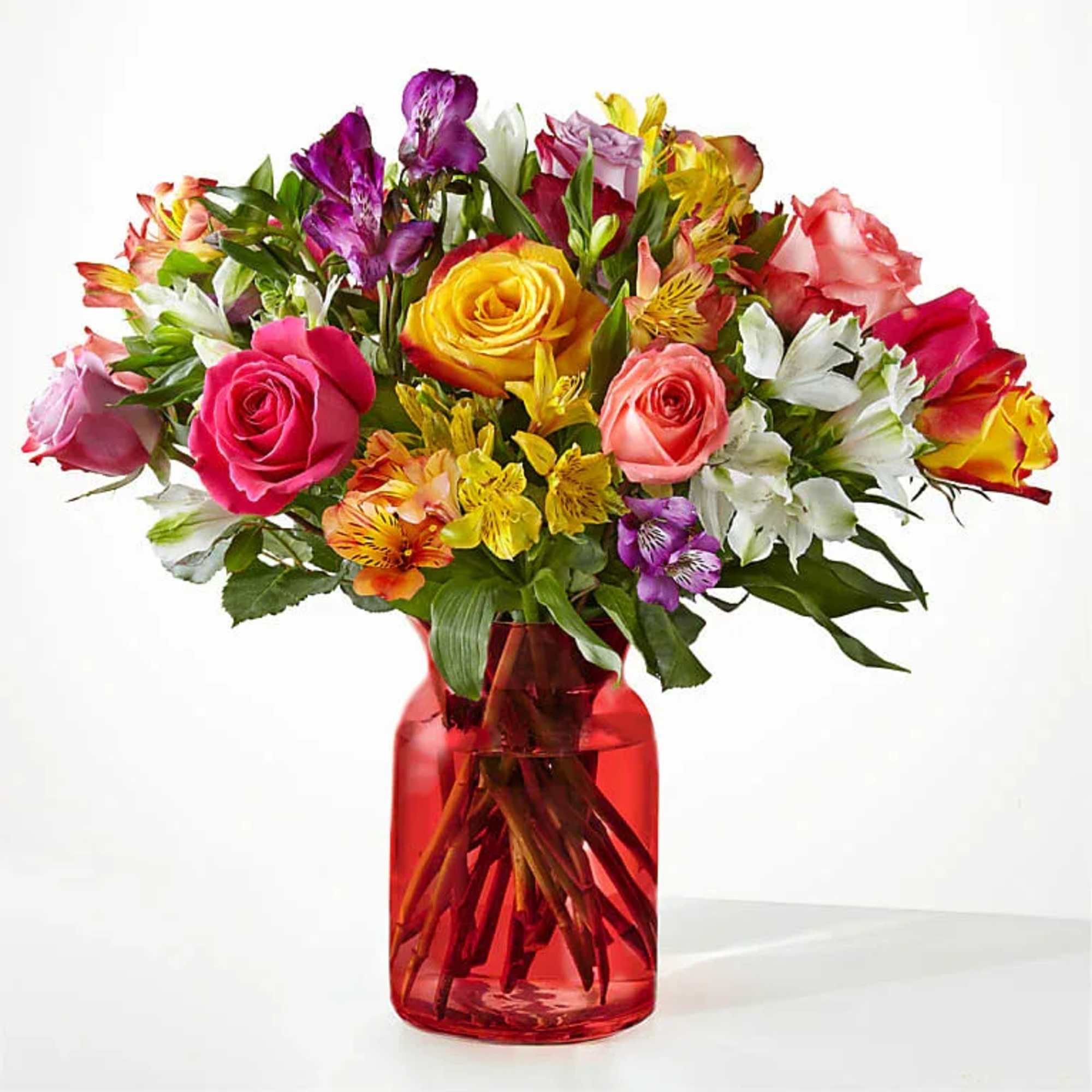 Bring a rainbow of color to any home with this bouquet. Blooming