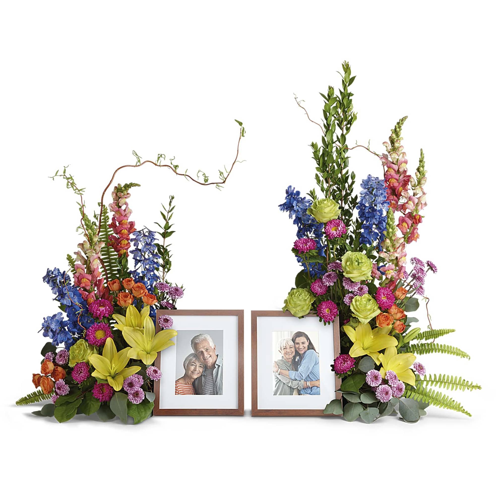 Two floral photo frame arrangements with colorful blooms and framed portraits