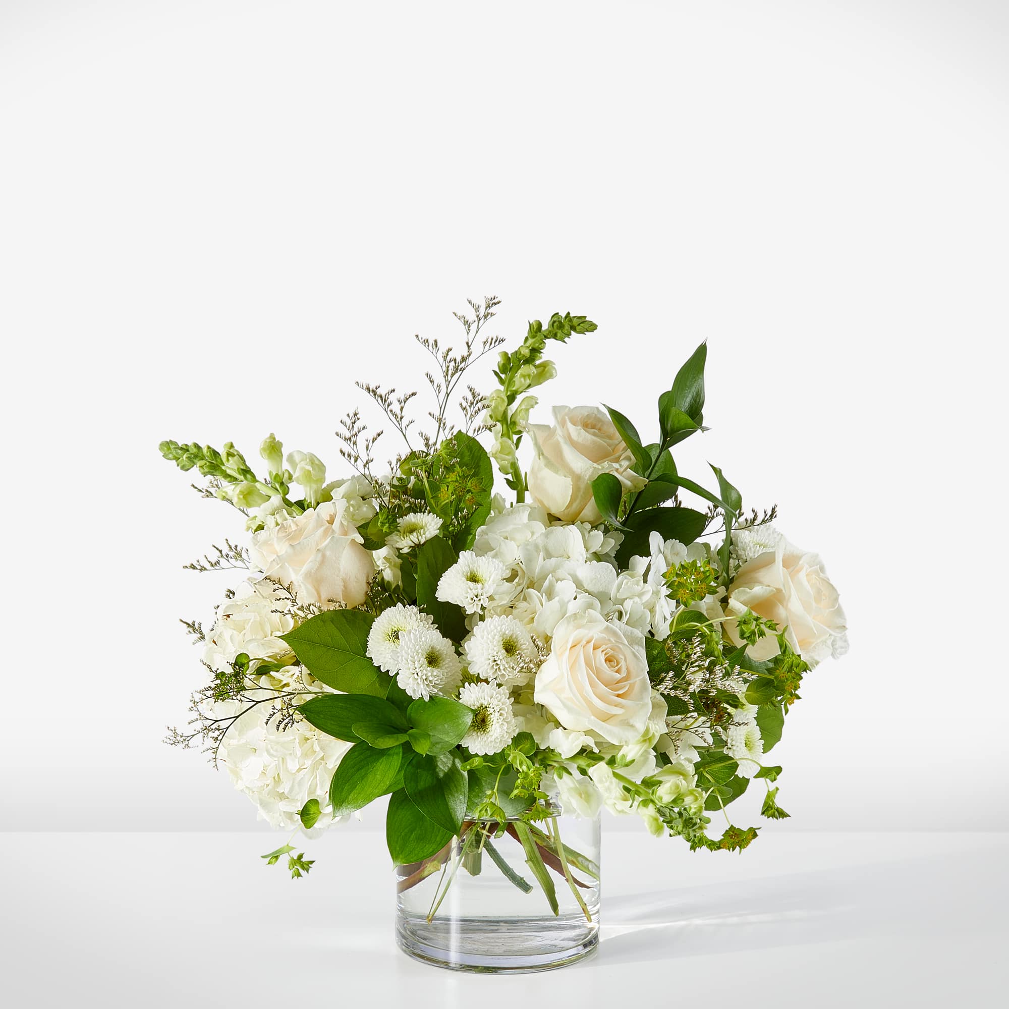 A sweet treat in the form of creamy, white florals and greenery.
