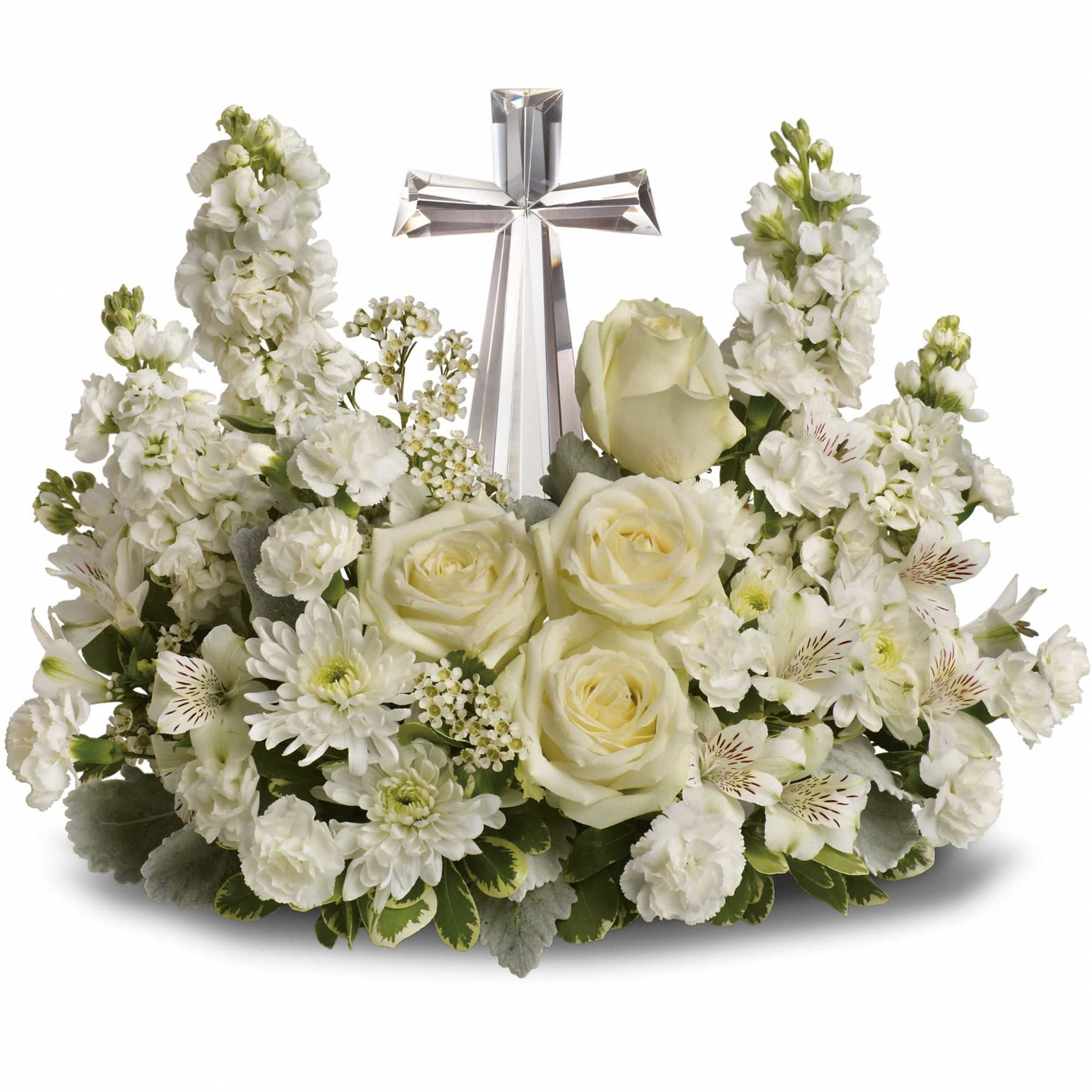 White floral arrangement with a silver cross centerpiece