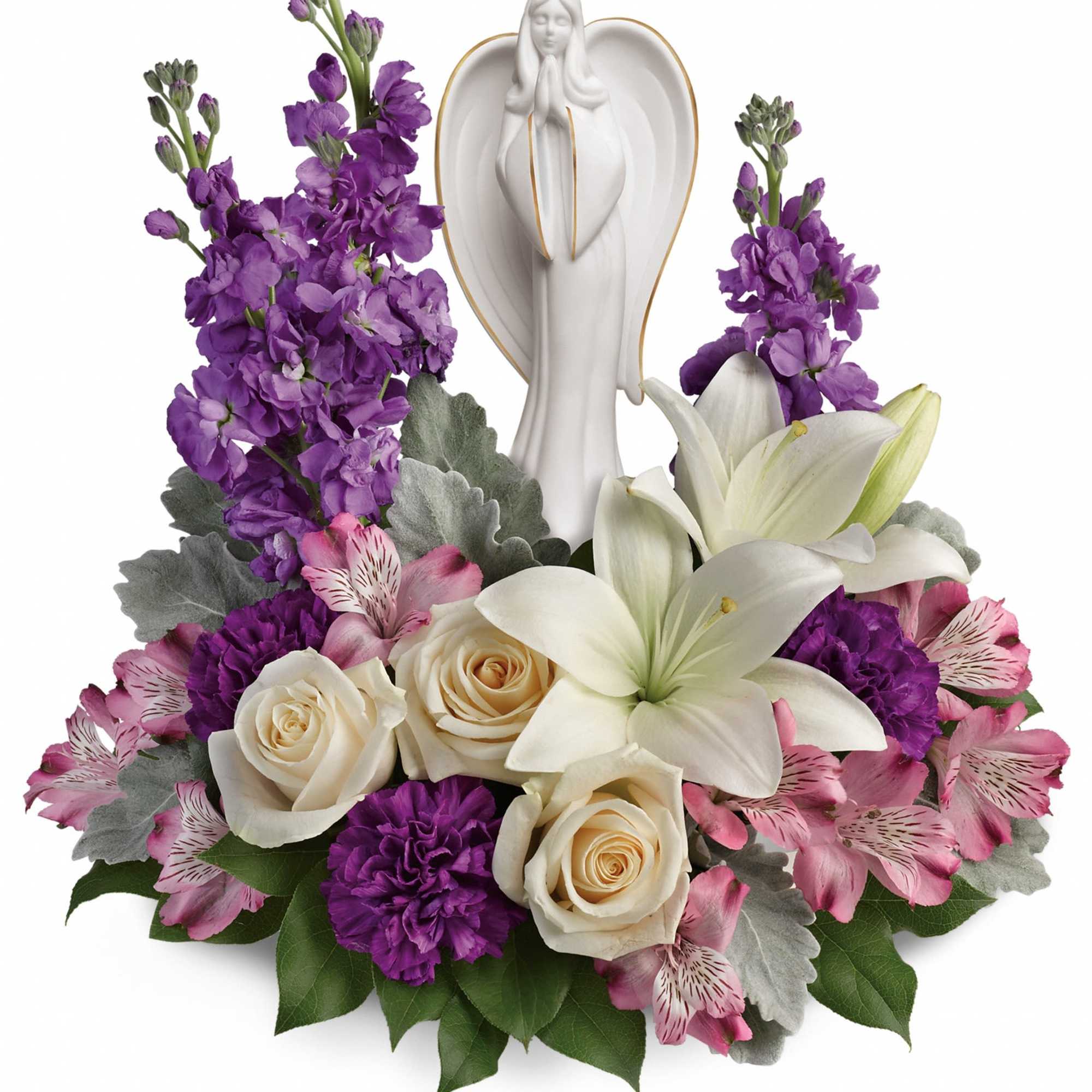 White angel figurine surrounded by purple and pink flowers