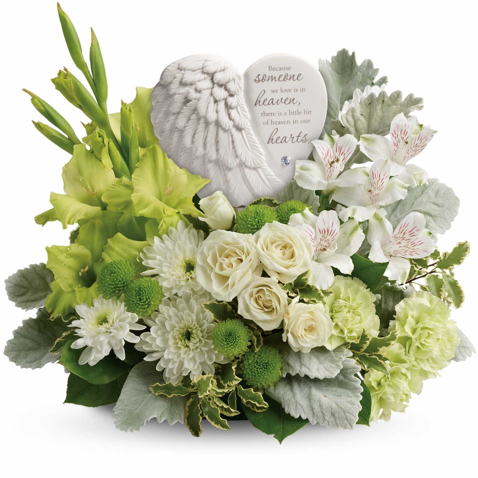 White sympathy bouquet with roses, lilies, and a memorial angel plaque