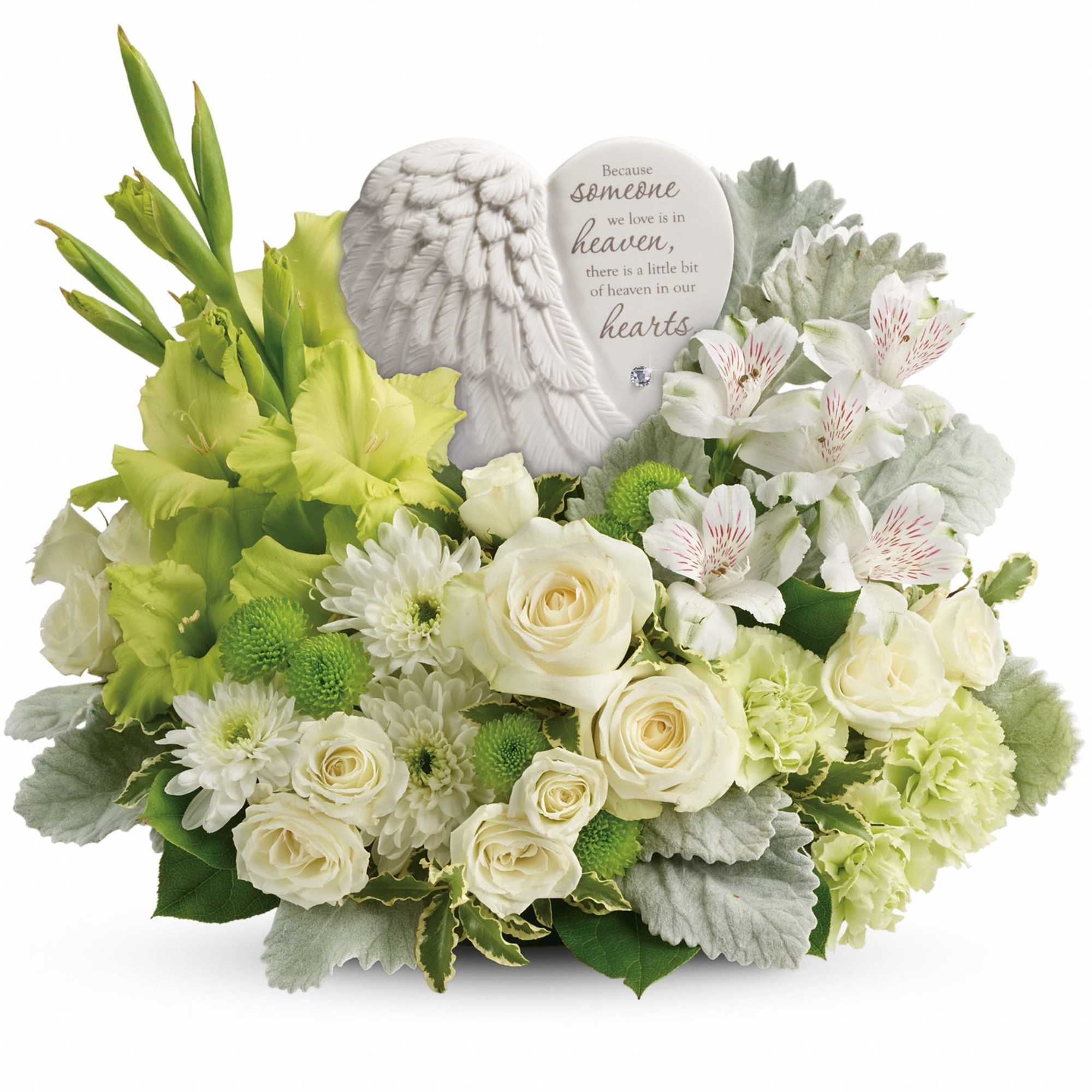 White and green sympathy arrangement with roses and a heart memorial plaque