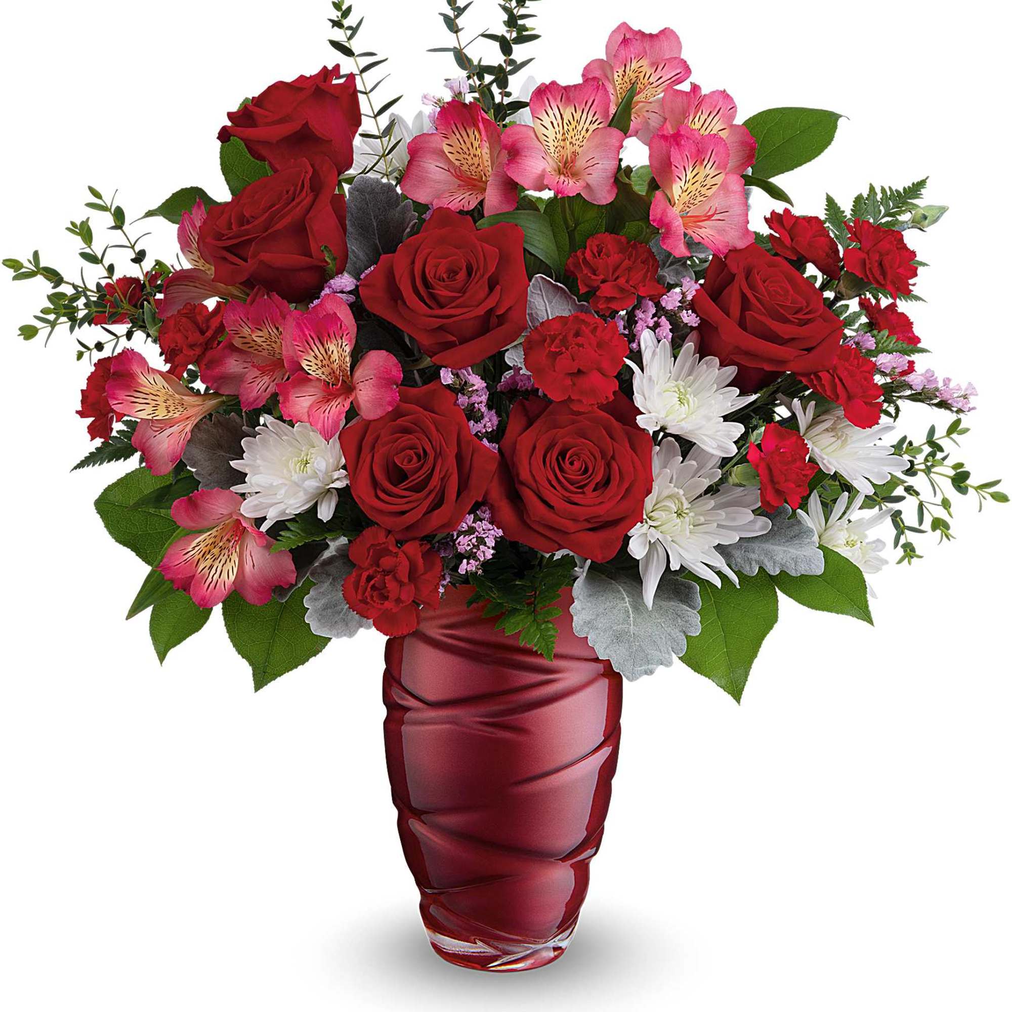 Red roses and pink alstroemeria in a red glass vase