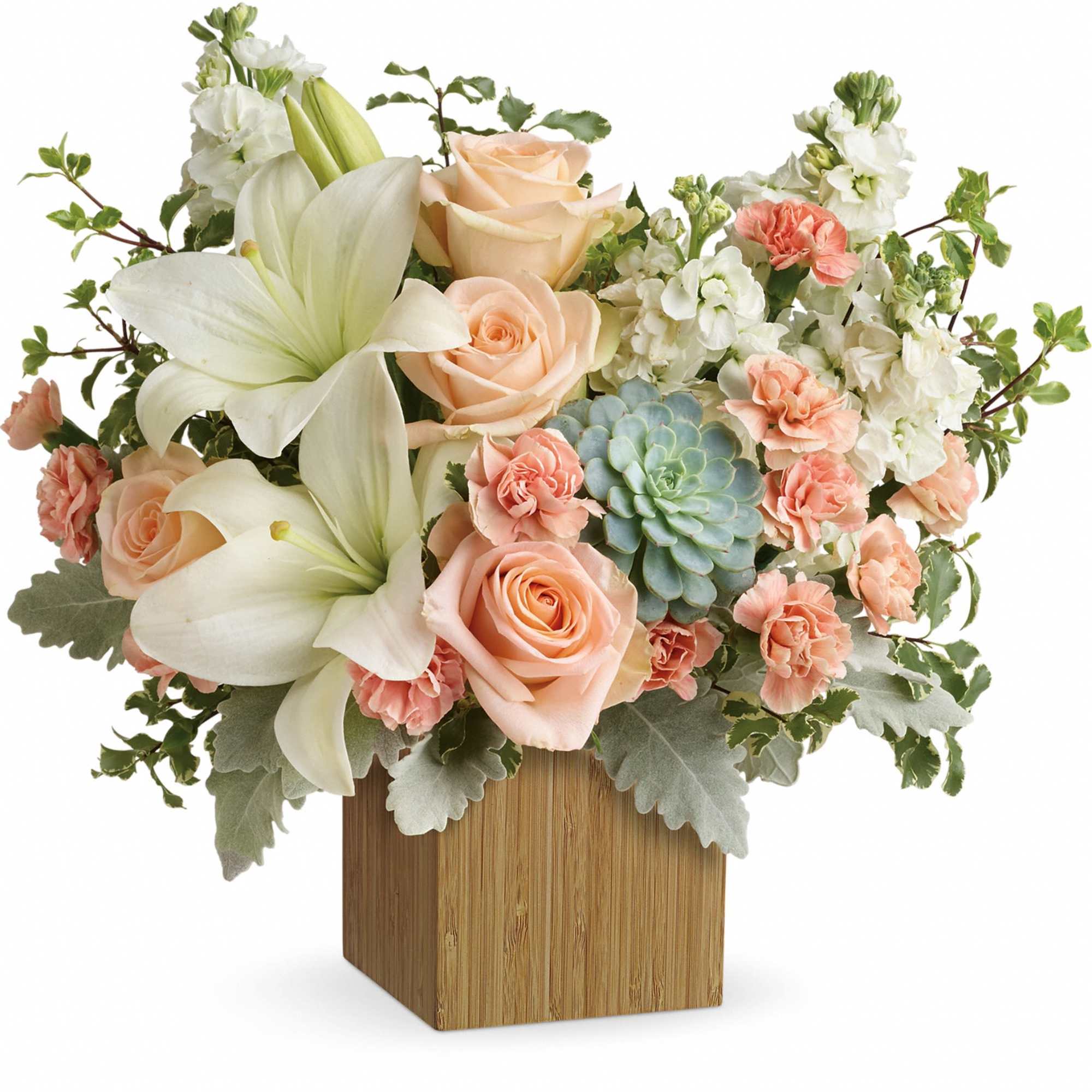 Peach roses and white lilies in a wooden cube vase