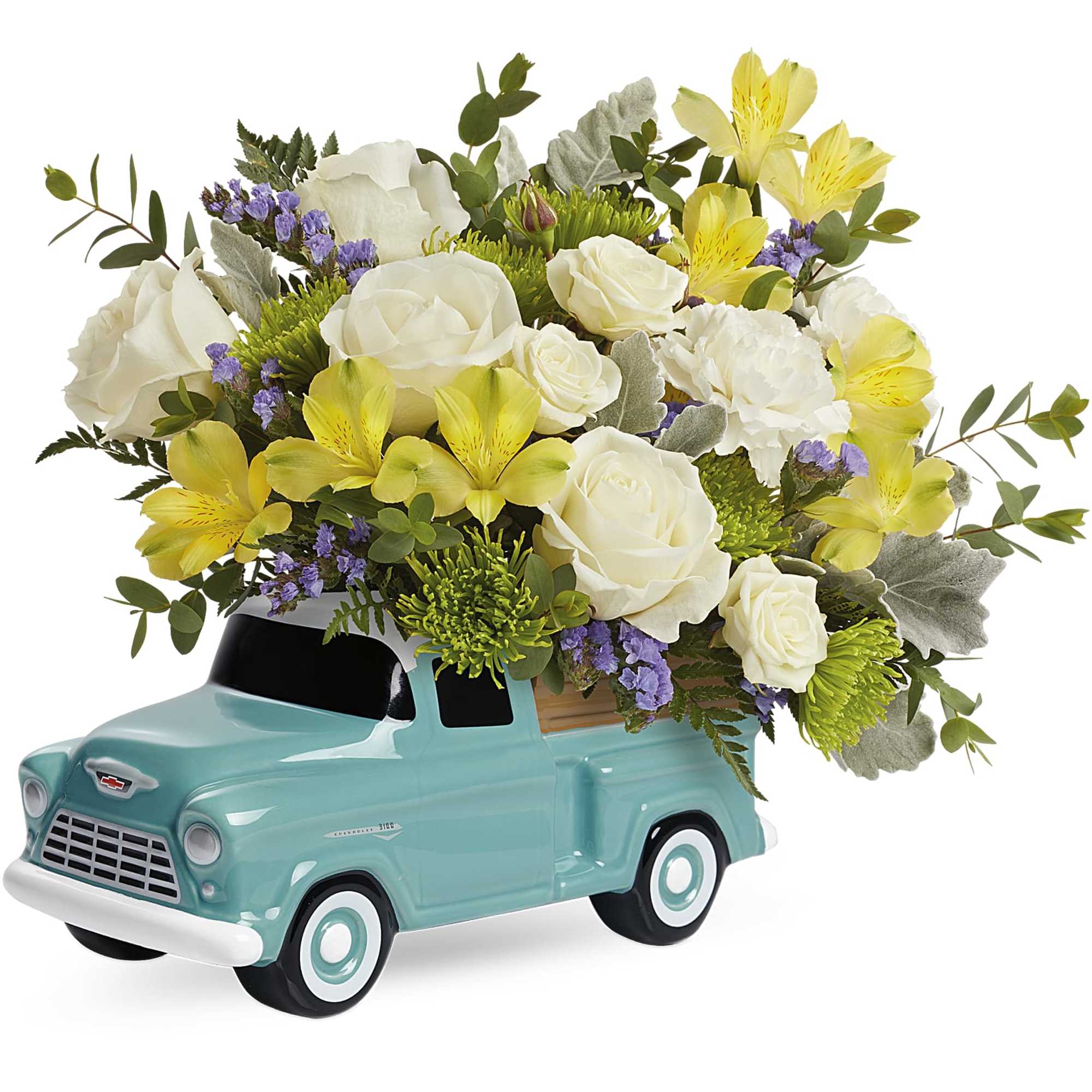 Floral arrangement in a turquoise pickup truck planter
