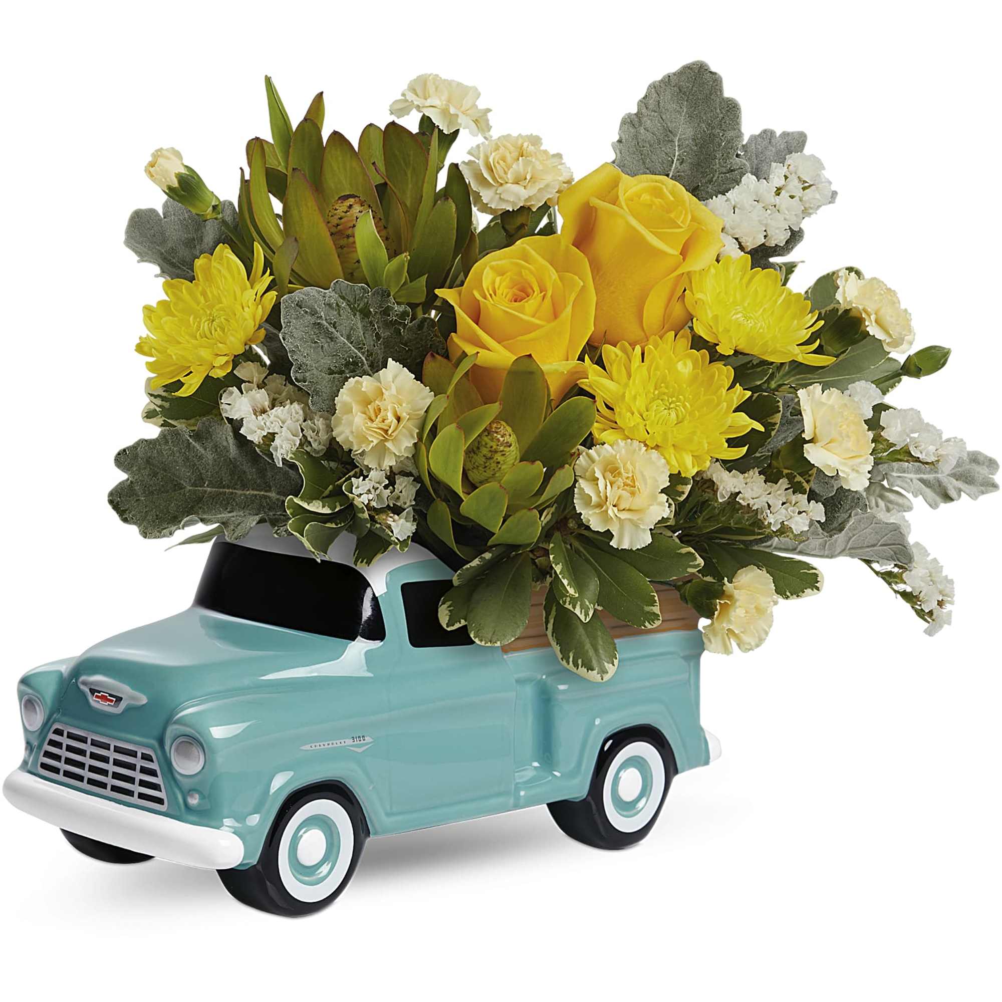 Yellow roses and chrysanthemums arranged in a turquoise truck planter