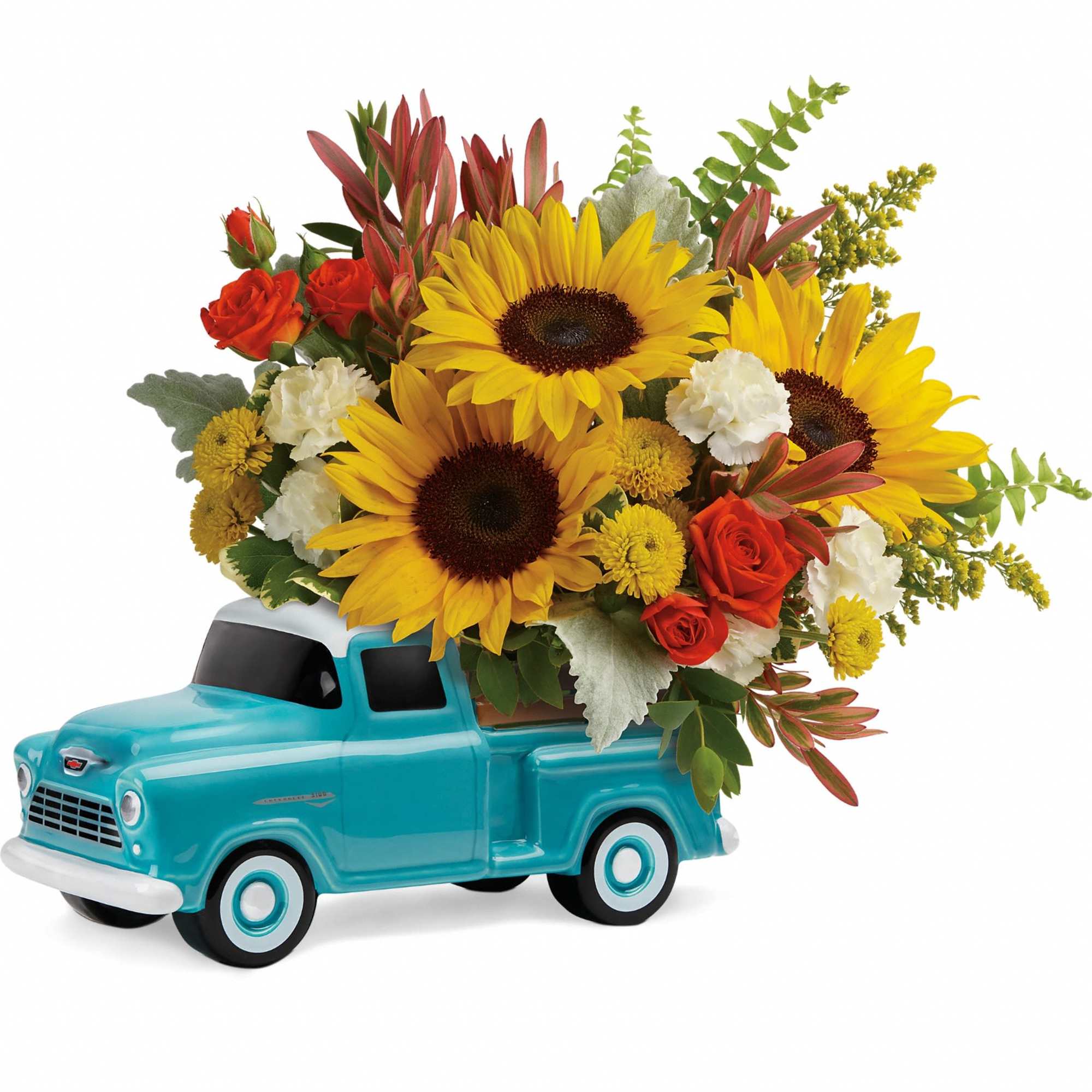 Sunflower and rose arrangement in a turquoise ceramic truck planter