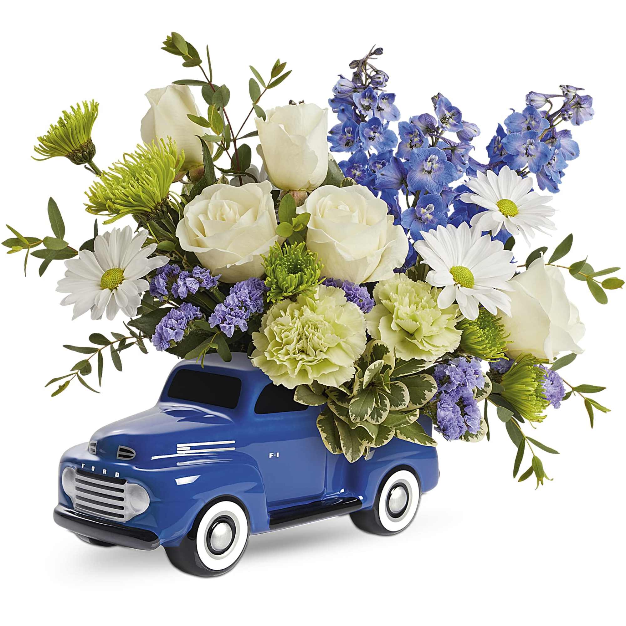 Blue toy truck filled with white and blue flowers