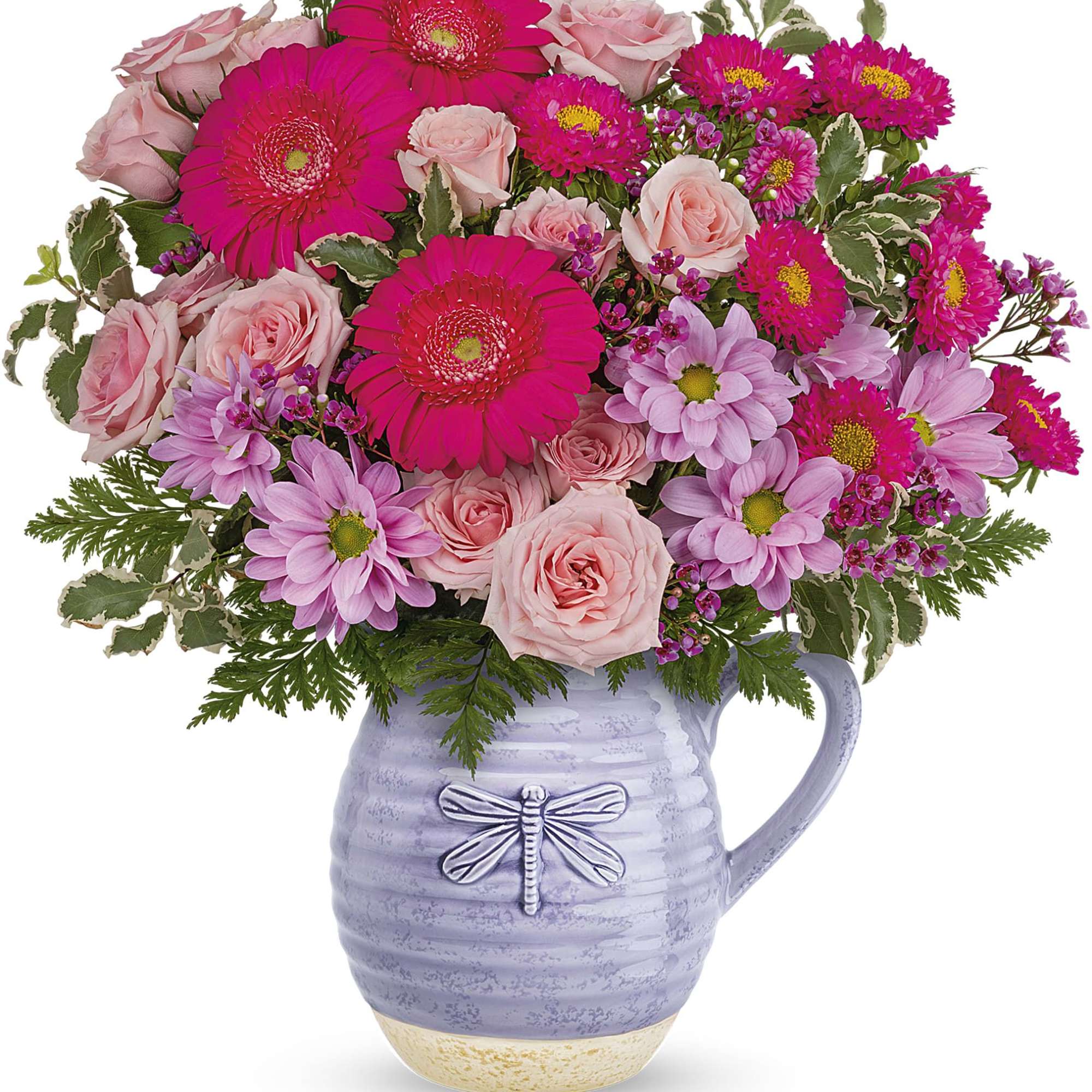 Pink roses and magenta daisies in a lavender pitcher vase