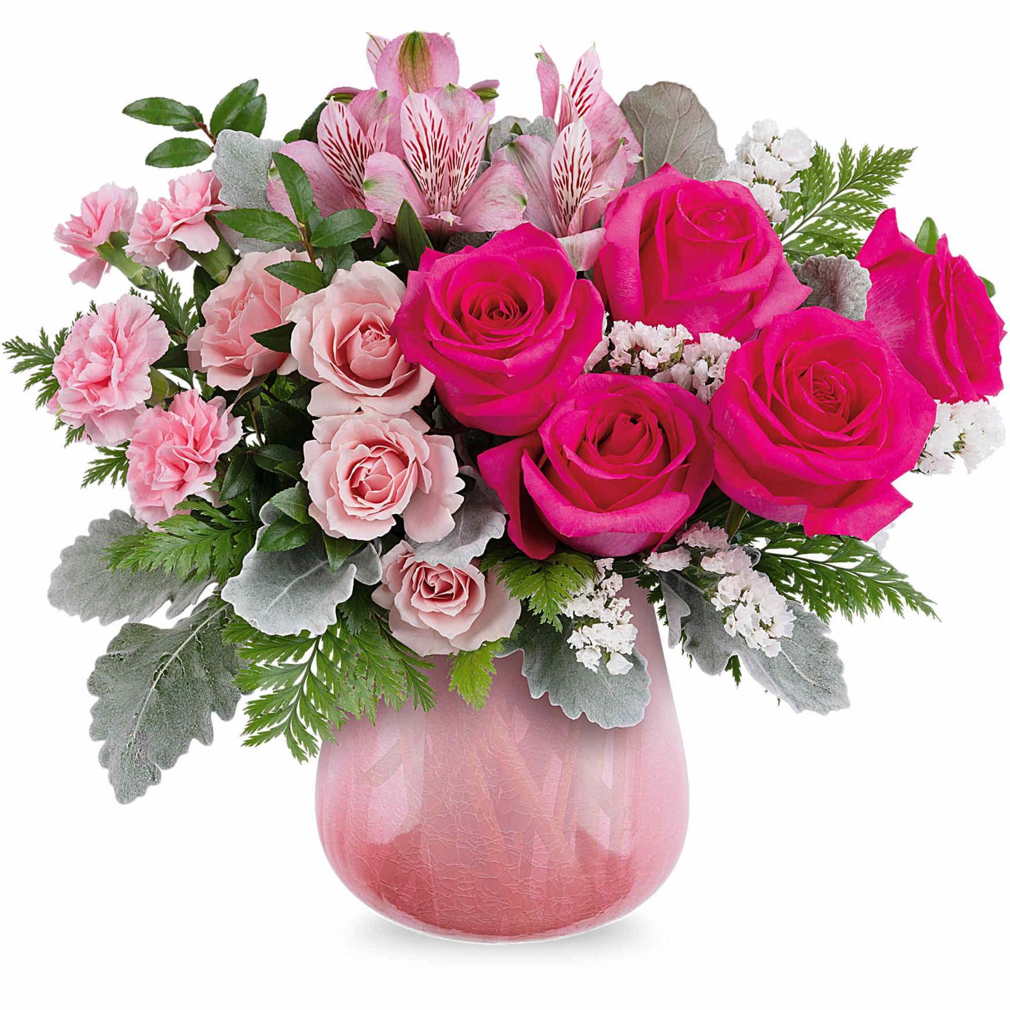 Pink roses and carnations in a pink vase