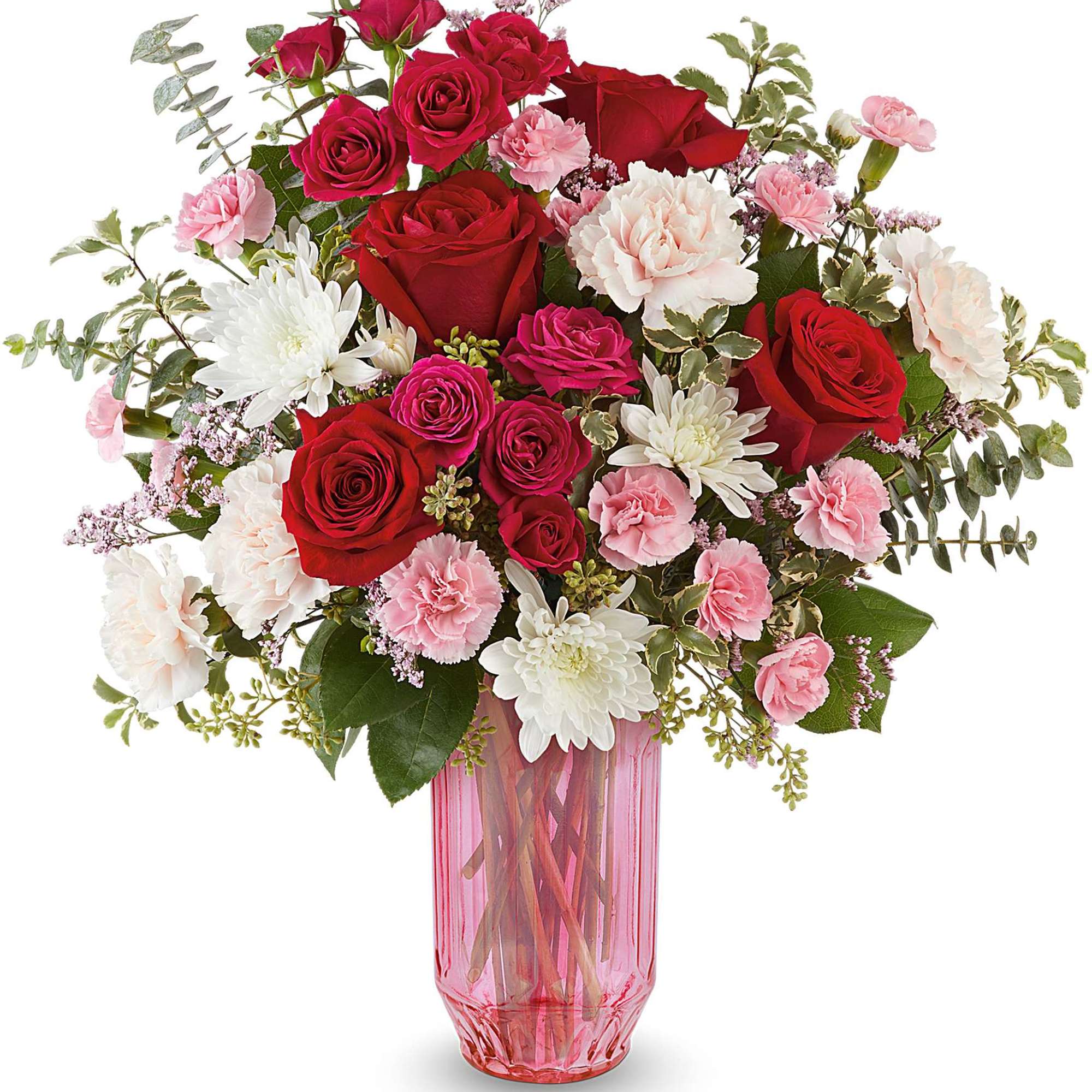 Bouquet of red and pink roses with white daisies in a pink glass vase