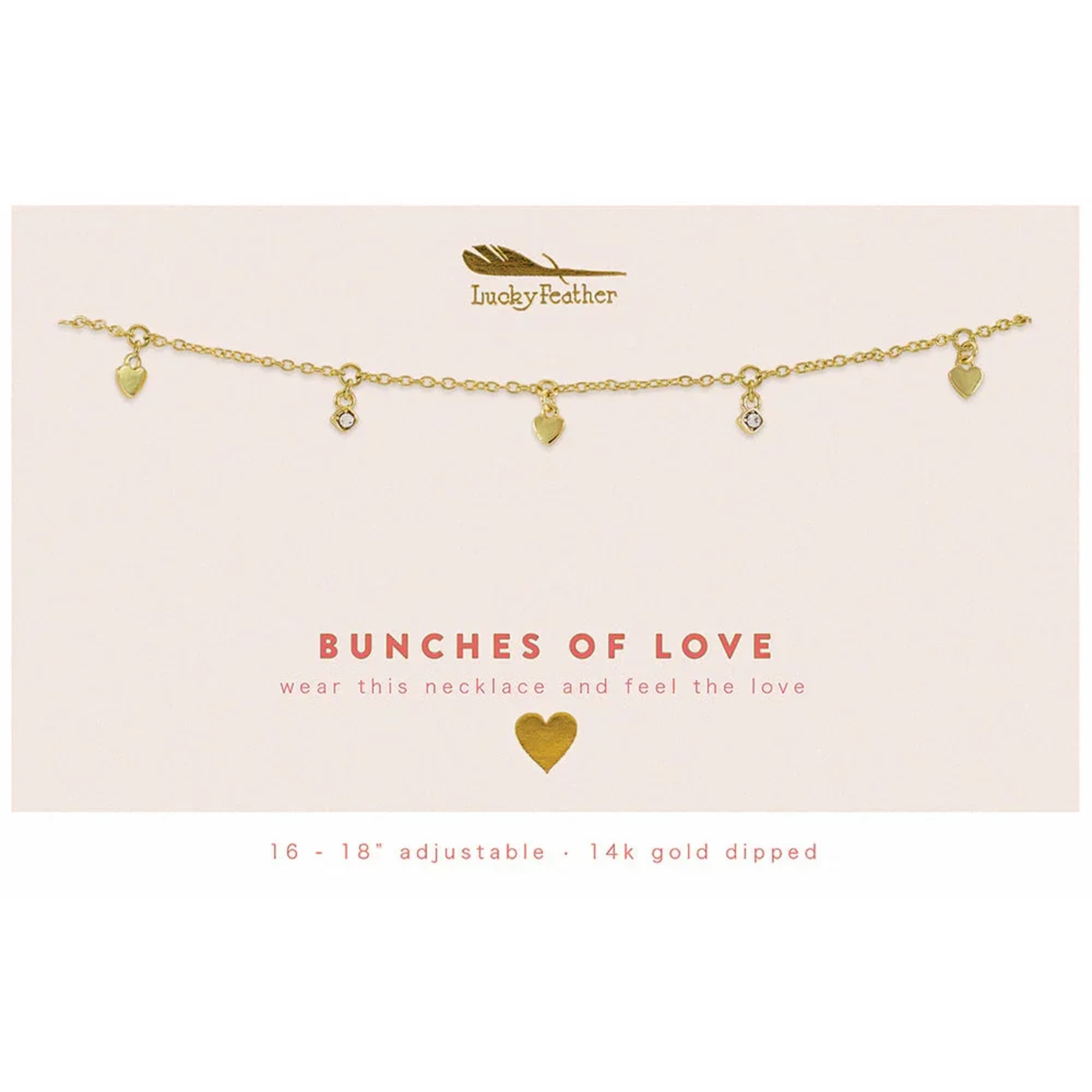 Gold charm necklace with small heart and crystal pendants on a cream card reading 'Bunches of Love'.