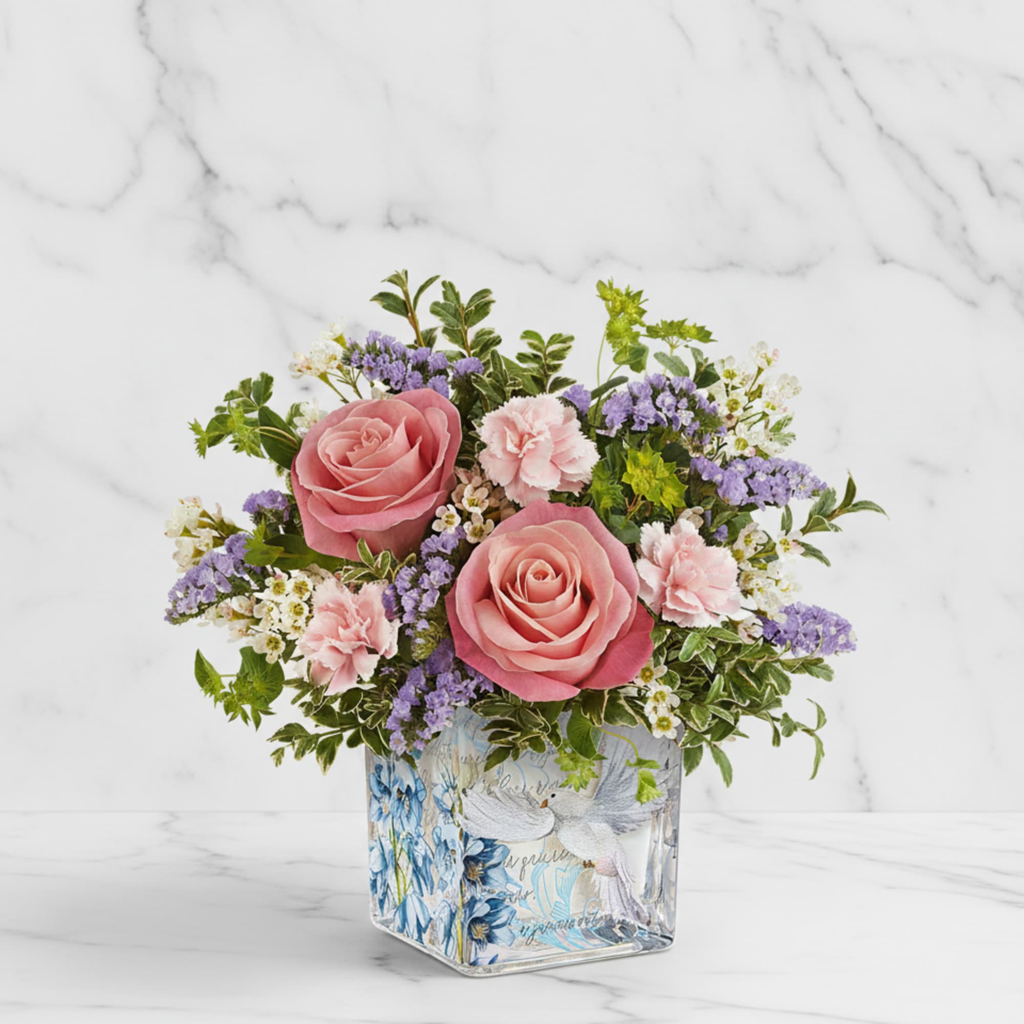 Softly serene, Our Whispers of Grace Bouquet blends pink roses and delicate