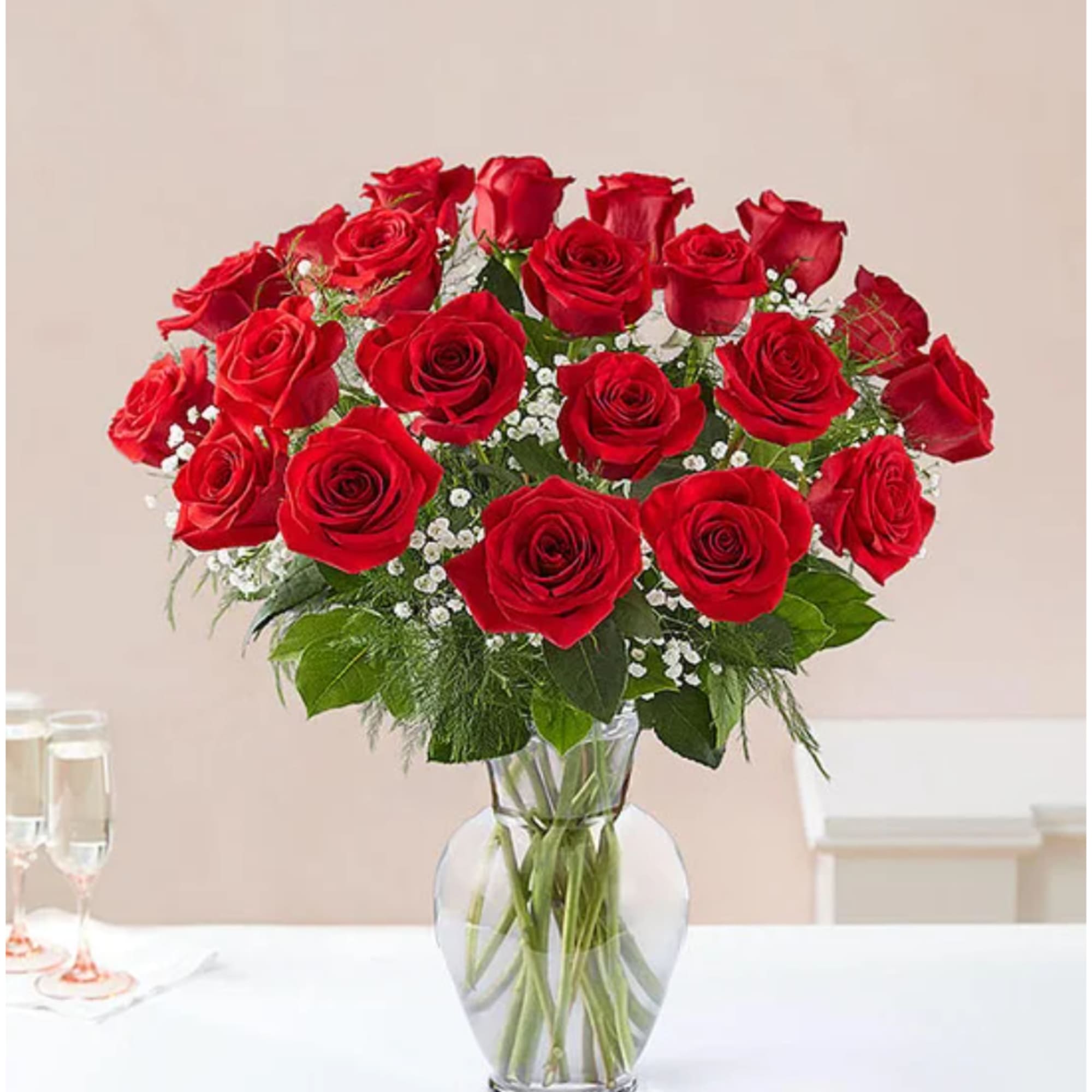 Bouquet of red roses in a clear glass vase