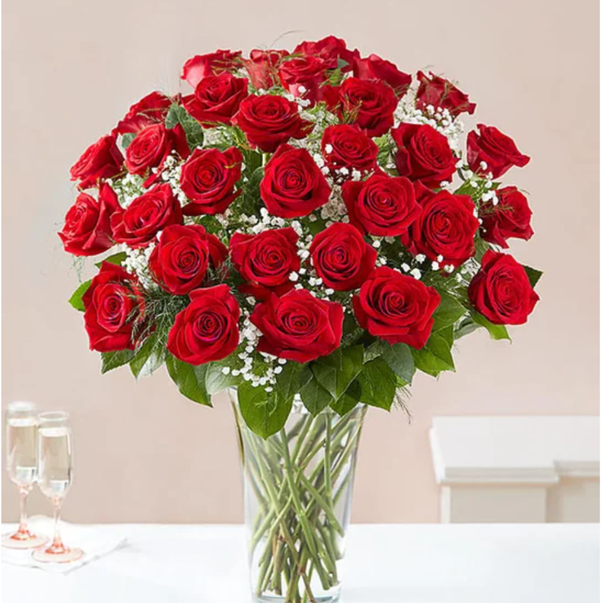 Bouquet of red roses in a clear glass vase