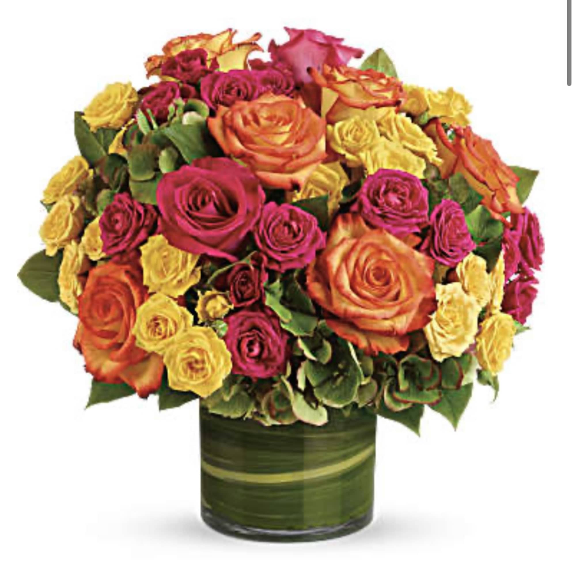 Bouquet of orange, pink, and yellow roses in a green glass vase