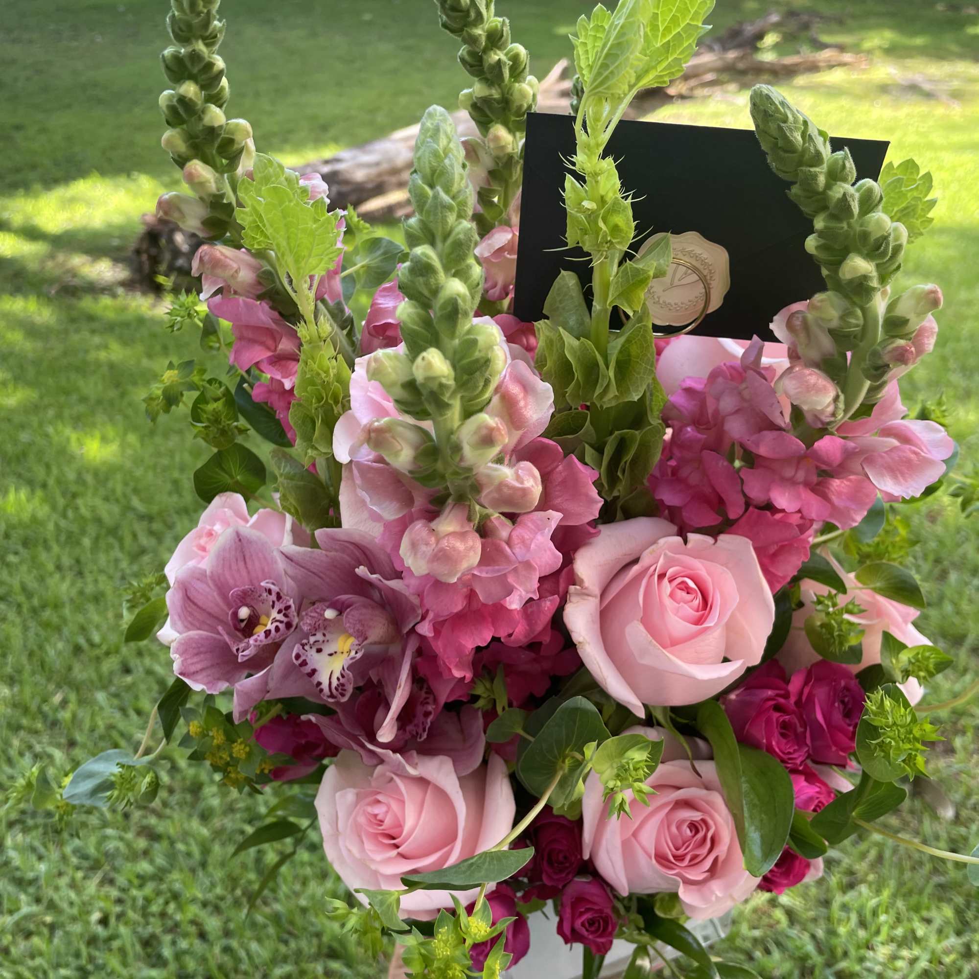 Escape to paradise with this lush and vibrant bouquet. This arrangement contains