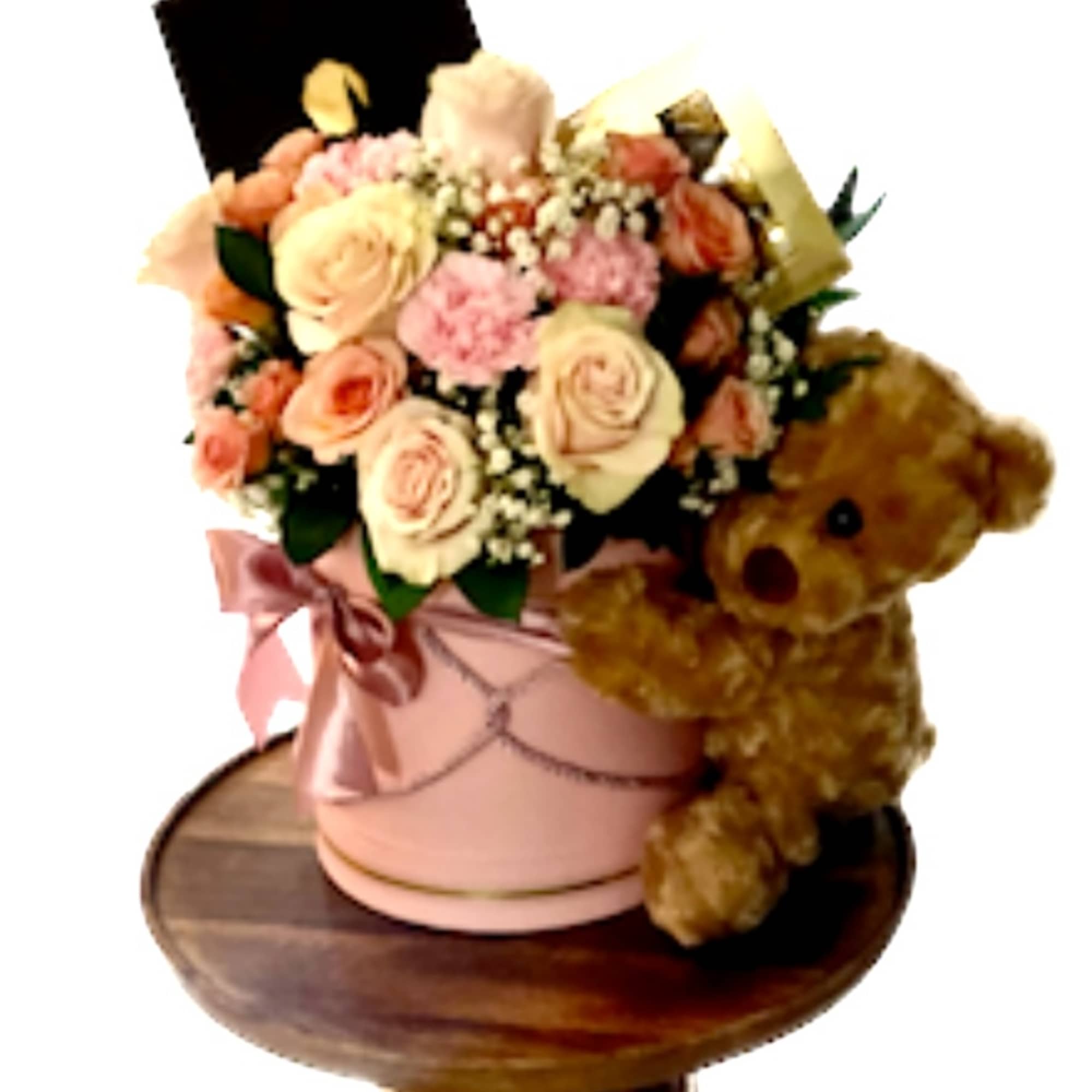 Pink and peach rose bouquet in a pink hatbox with a teddy bear